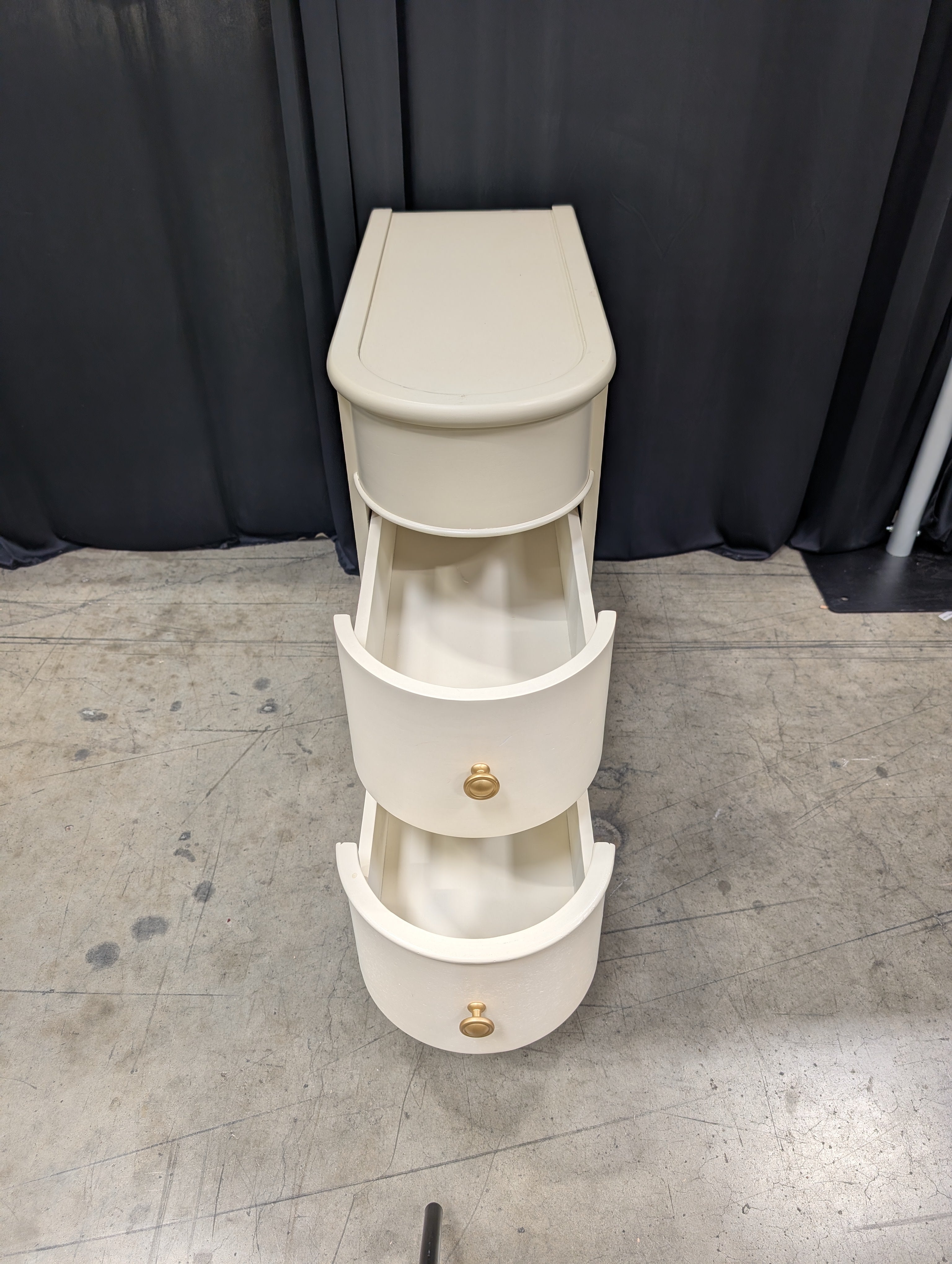 Cream Curved Two-Drawer Nightstand with Gold Knob
