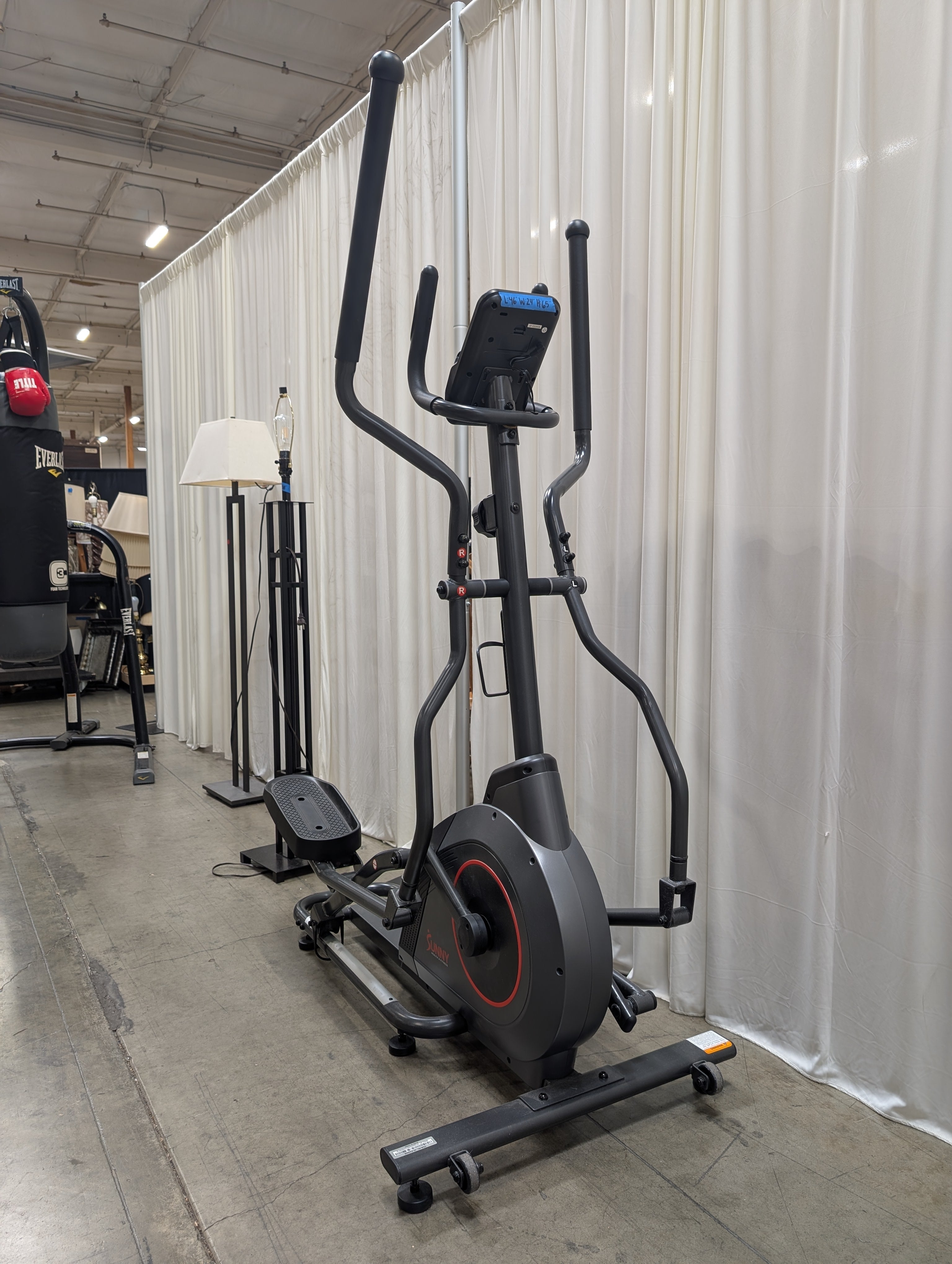 Black Magnetic Elliptical Trainer with Red Accents