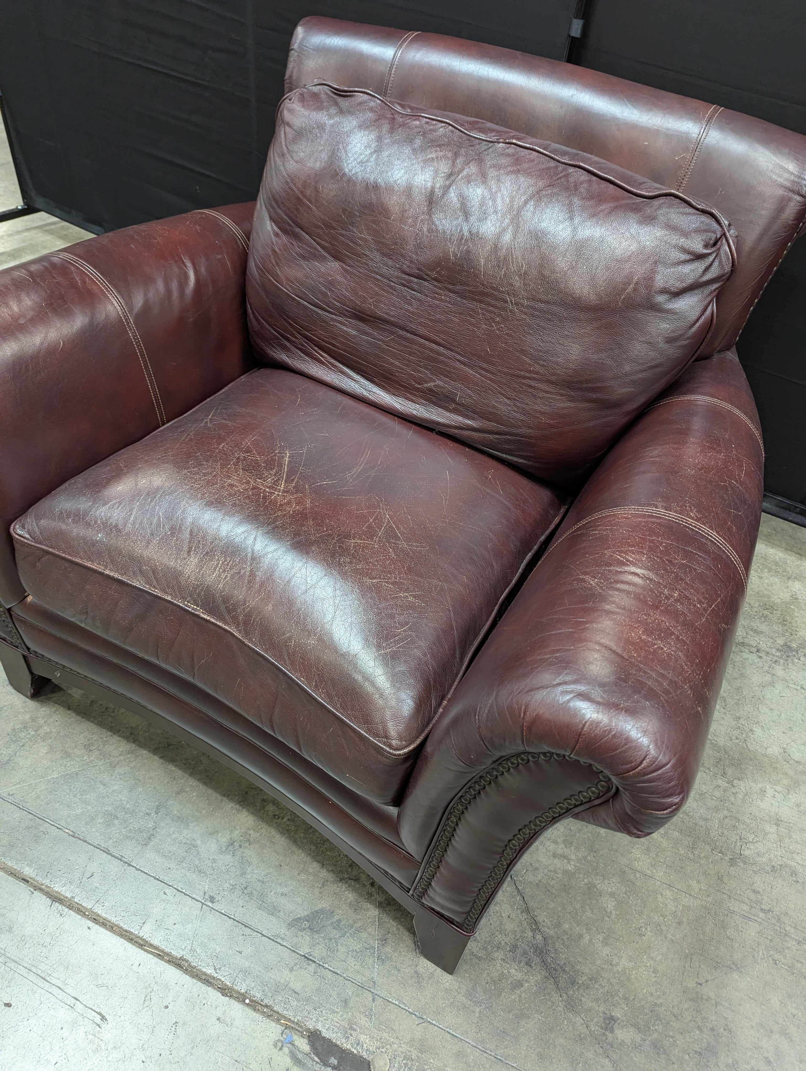 Traditional Deep Reddish-Brown Leather Armchair with Nailhead Trim