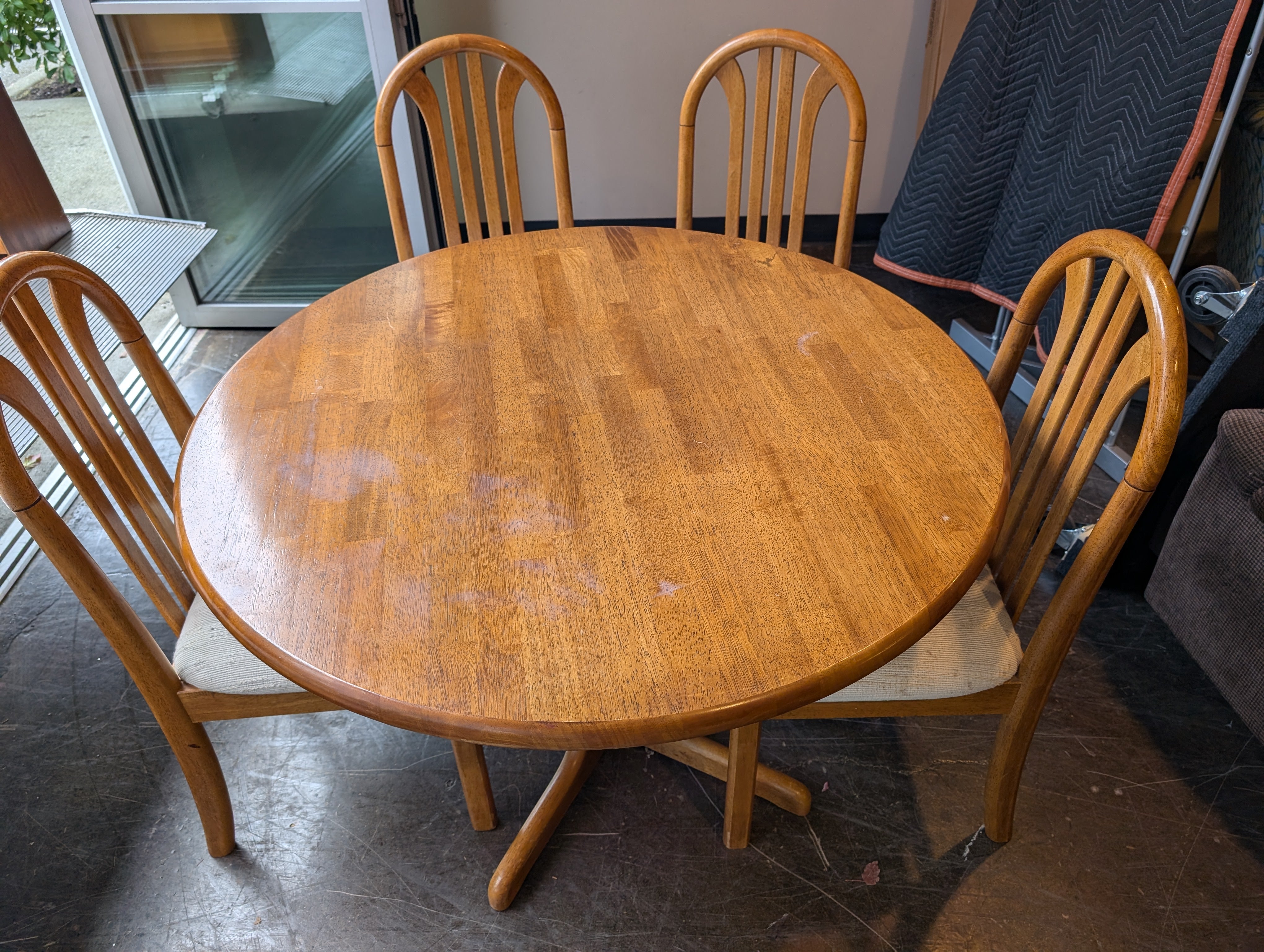 Five-Piece Wood Dining Set with Round Table and Padded Chairs