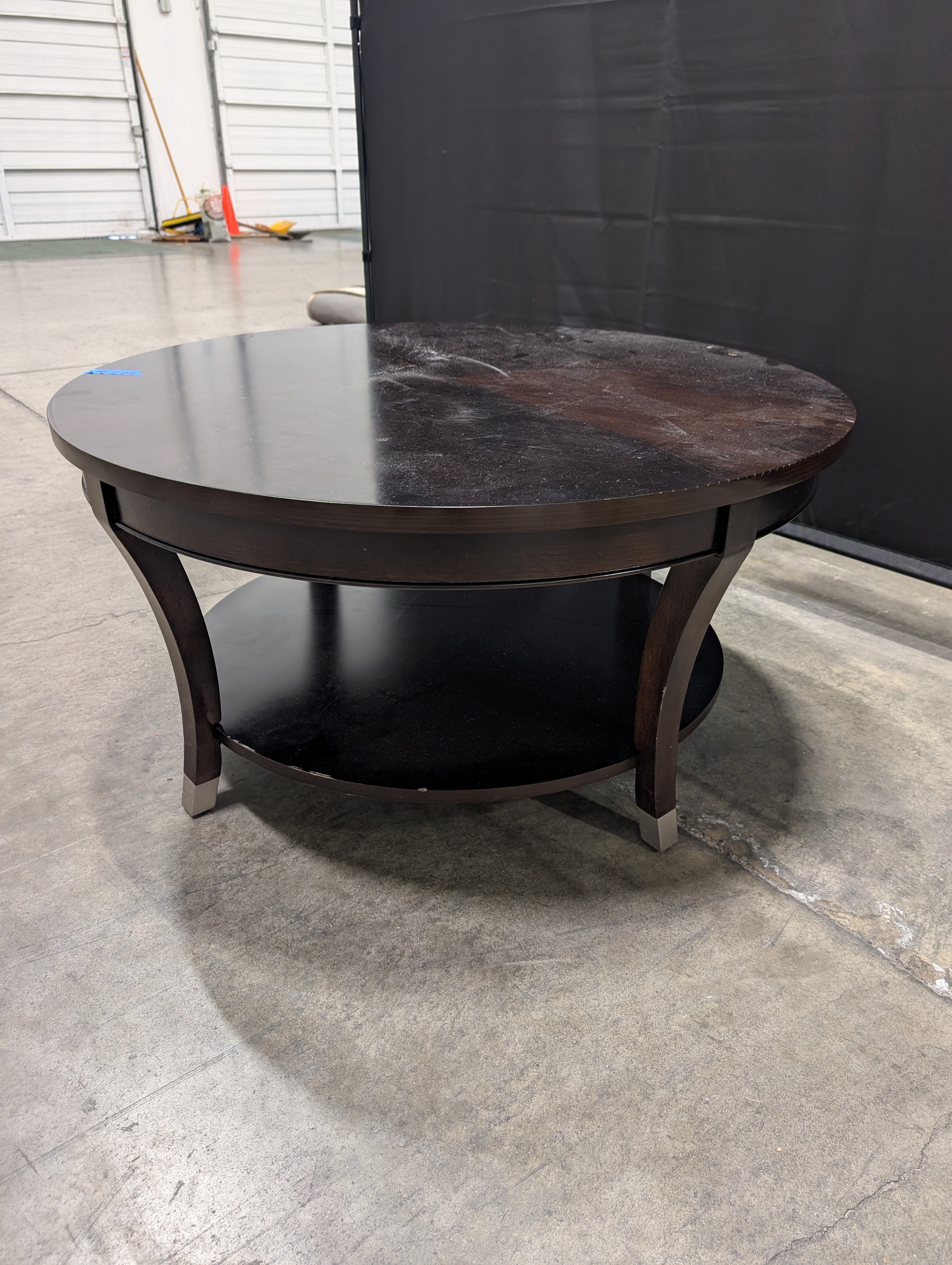 Contemporary Dark Wood Round Coffee Table with Lower Shelf