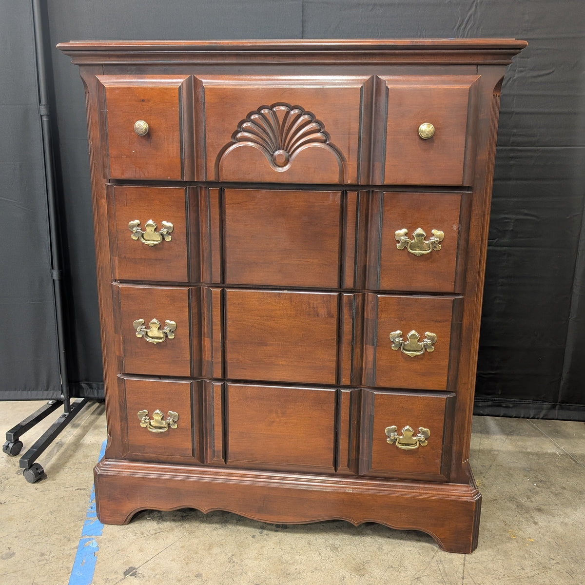 Traditional Dark Wood Dresser with Ornate Hardware