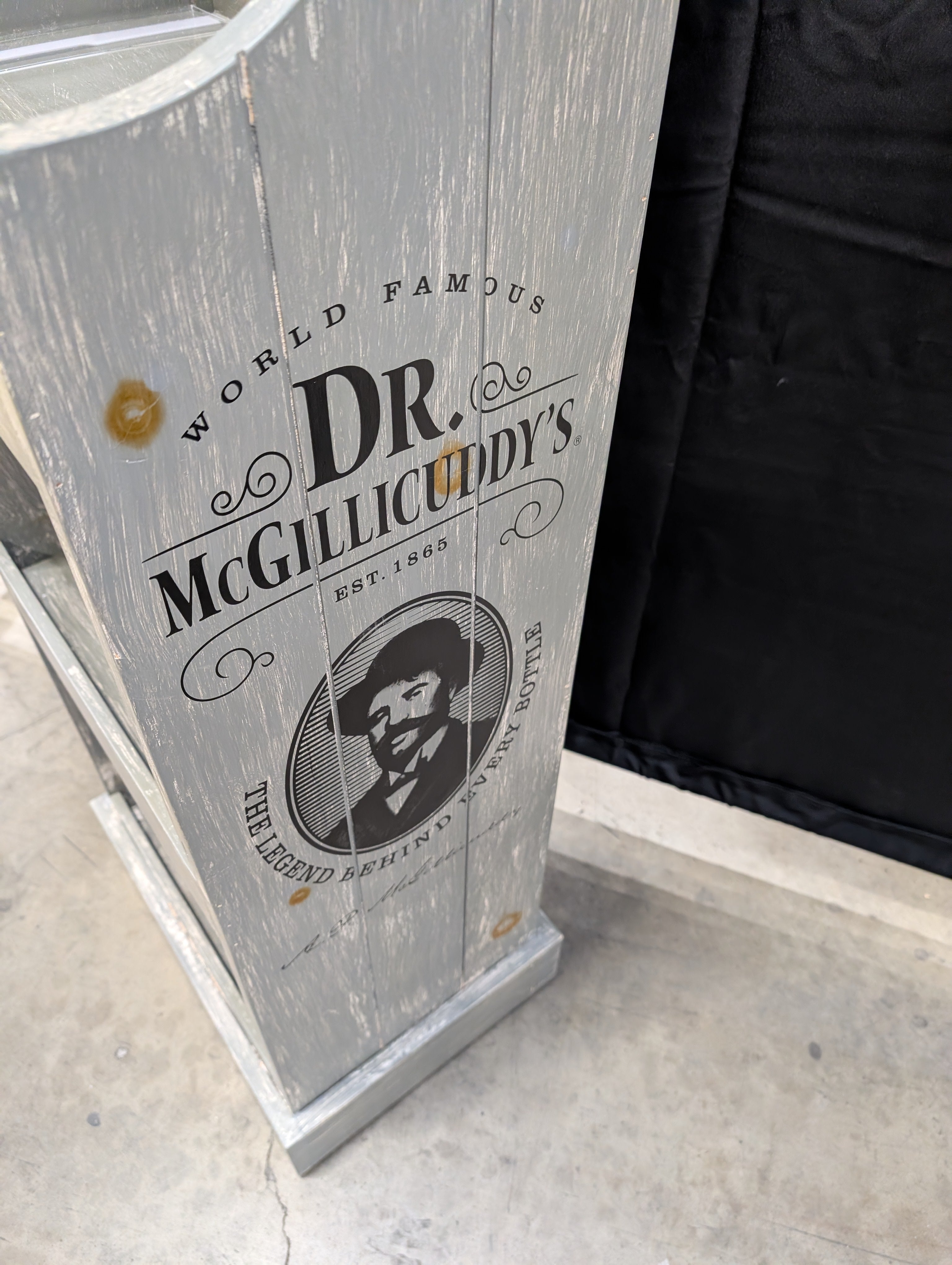Dr. McGillicuddy's Rustic Distressed Wood Display Shelf Unit