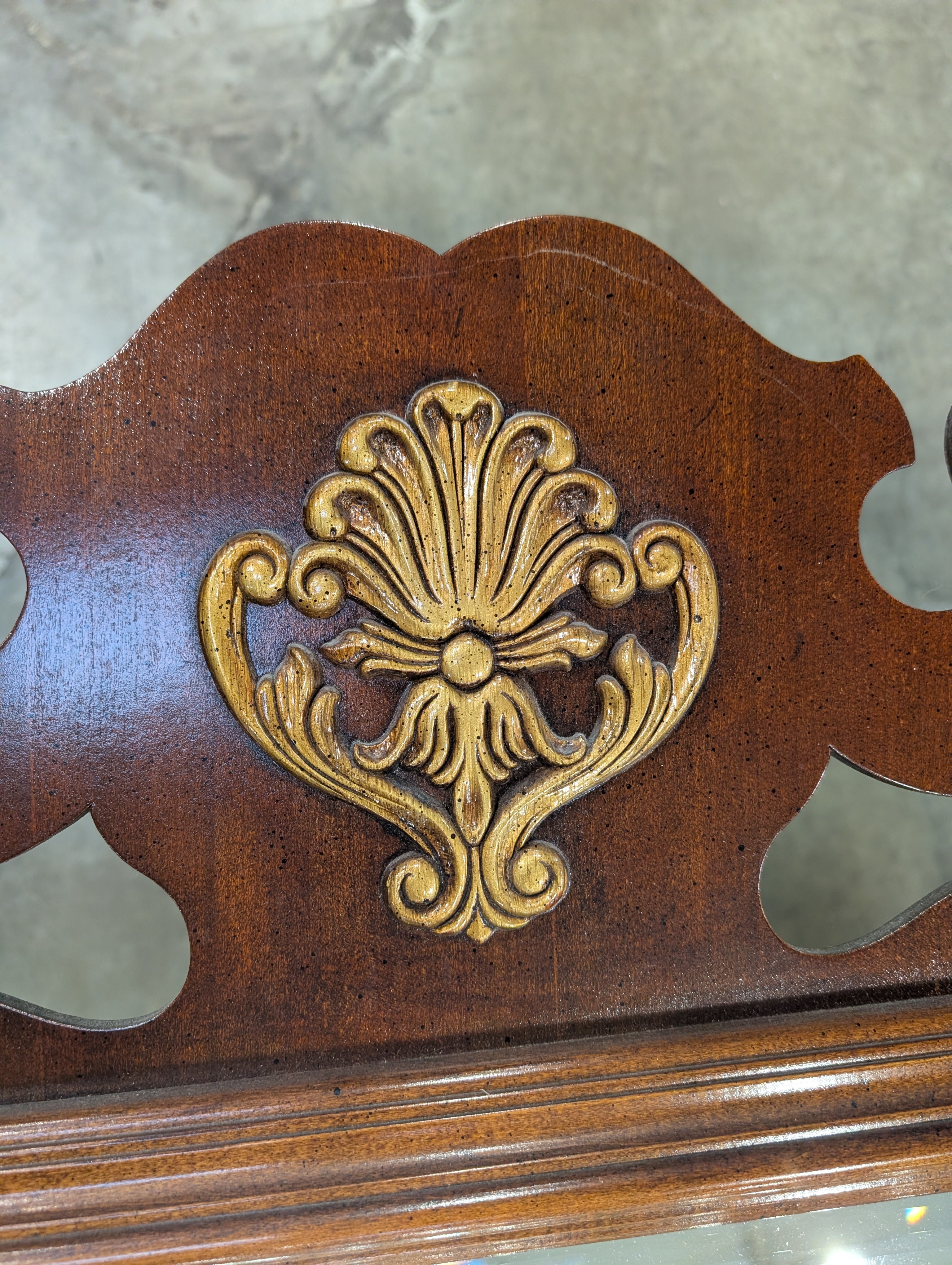 Ornate Scrolled Dark Wood Wall Mirror with Gilded Shell Accent