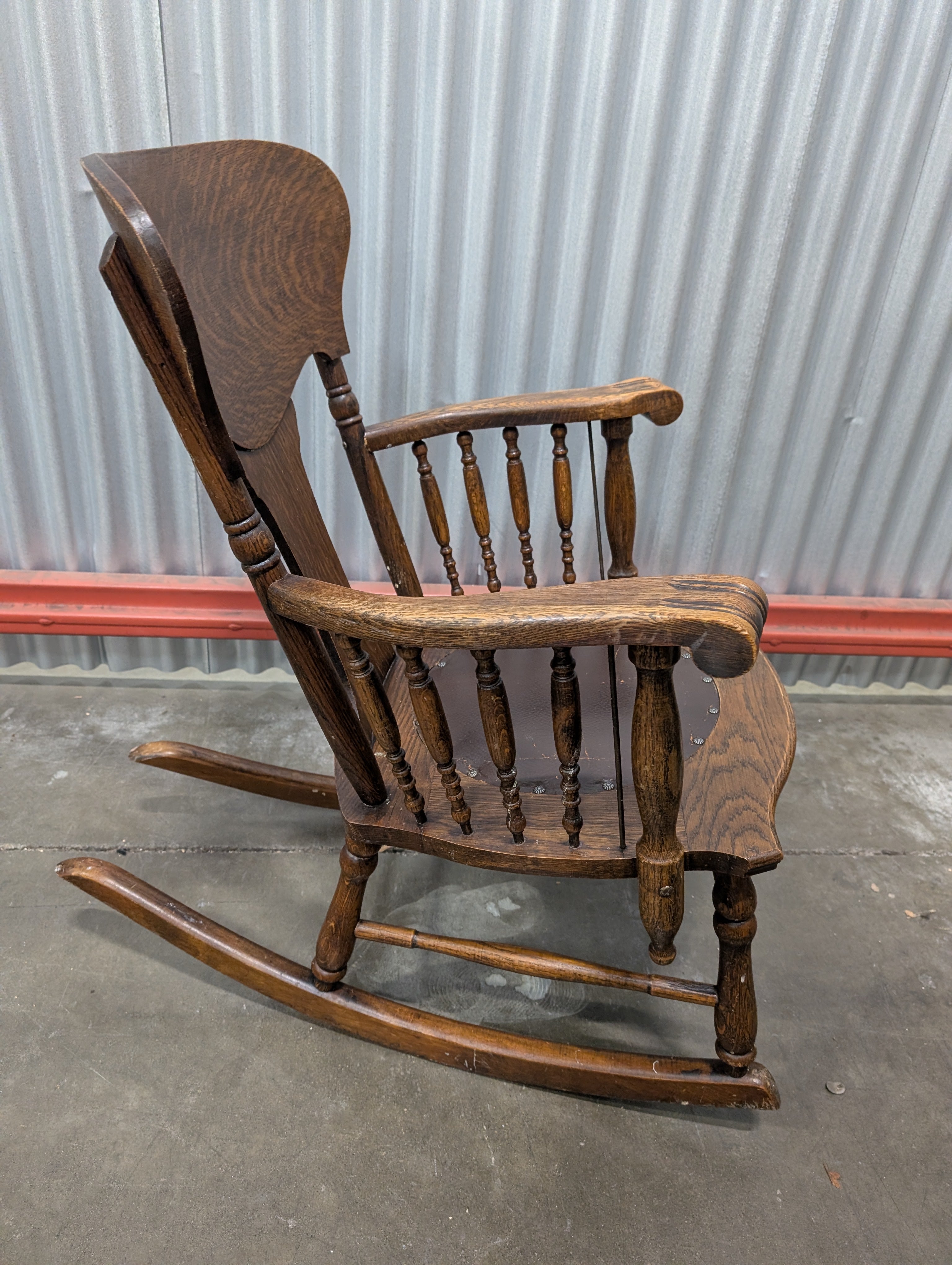 Antique Dark Wood Rocking Chair with Leather Seat