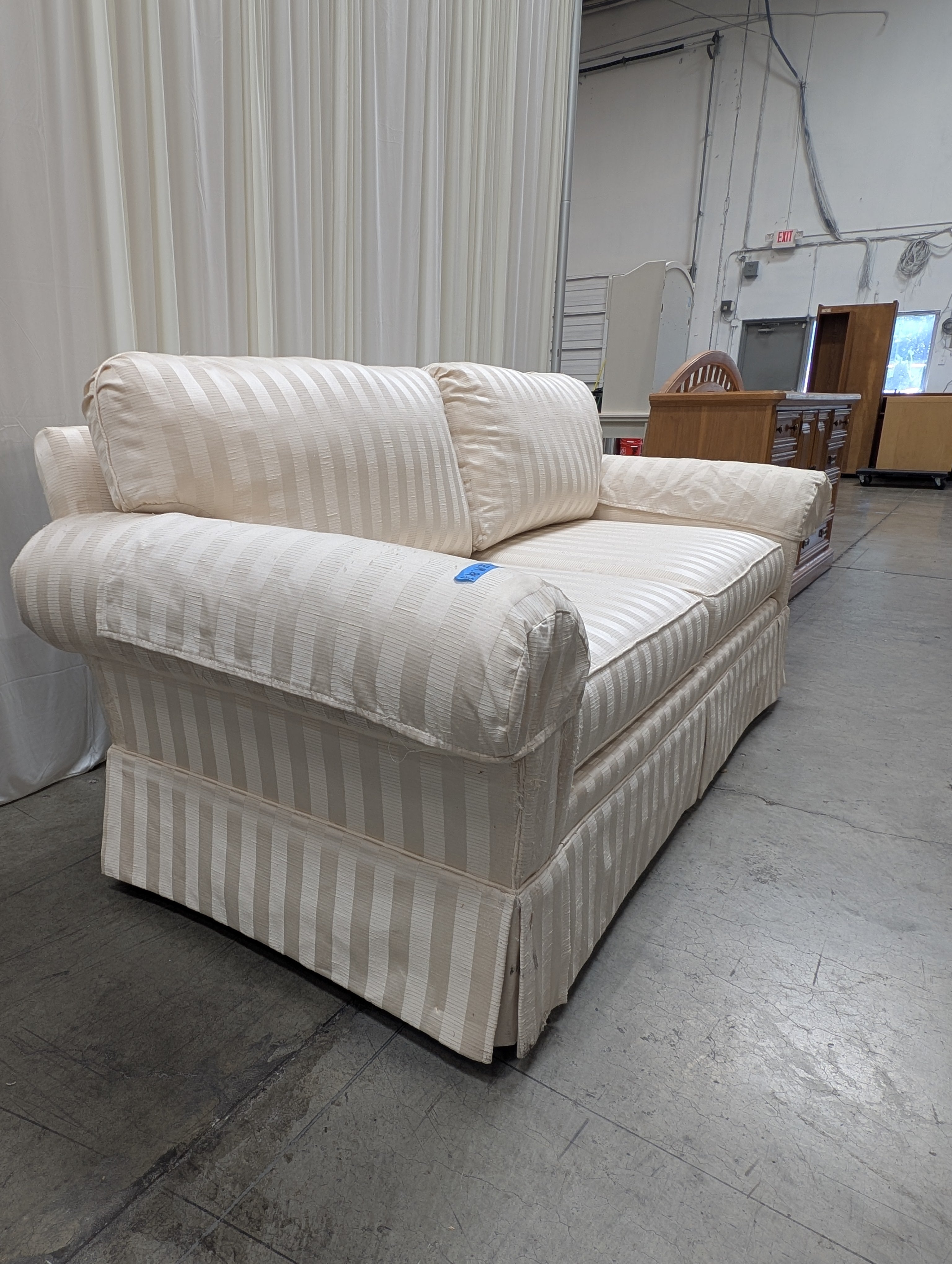 Woodmark Cream Striped Couch with Rolled Arms