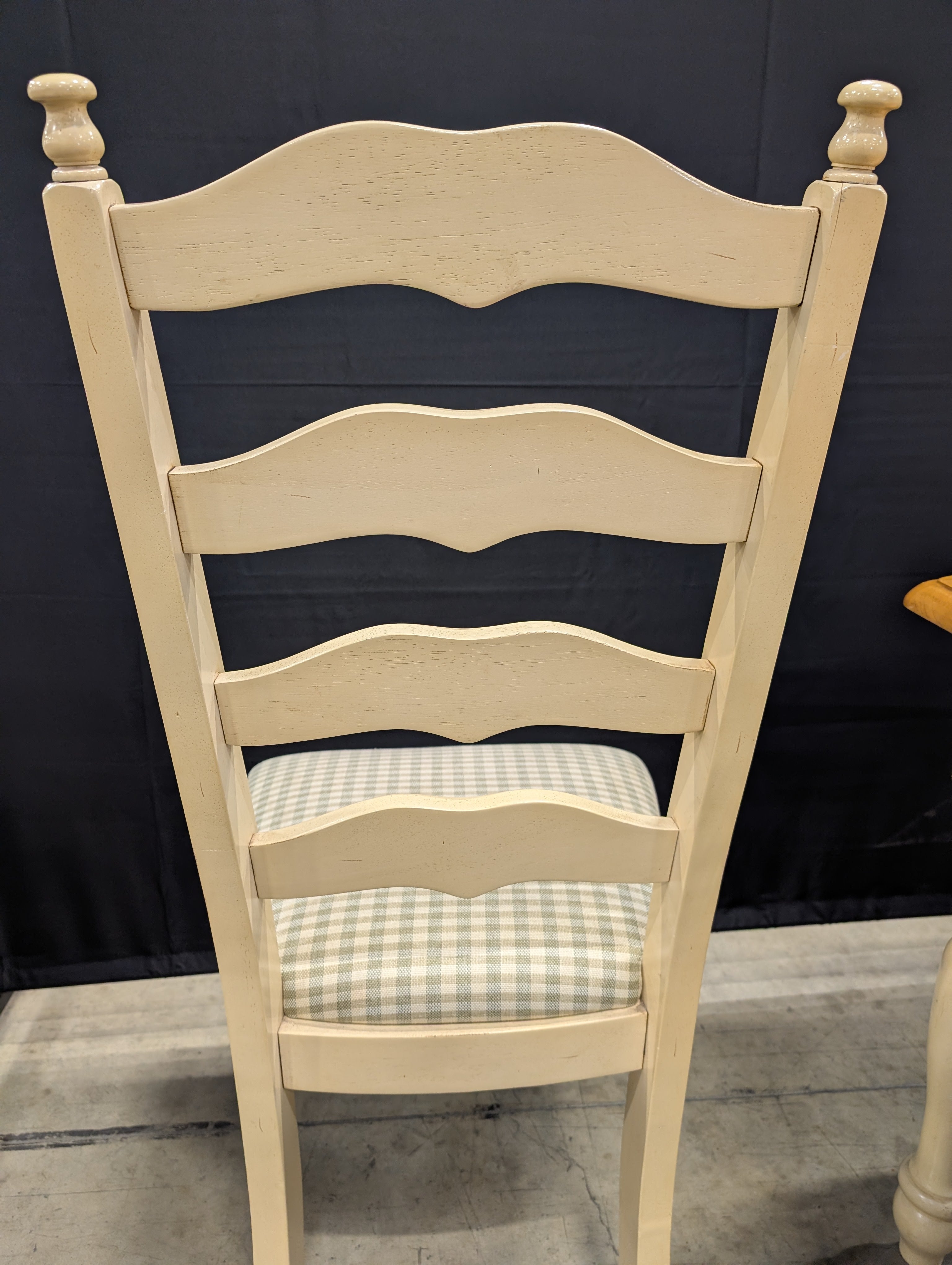 Rustic Wood Dining Table with Four Ladder-Back Chairs