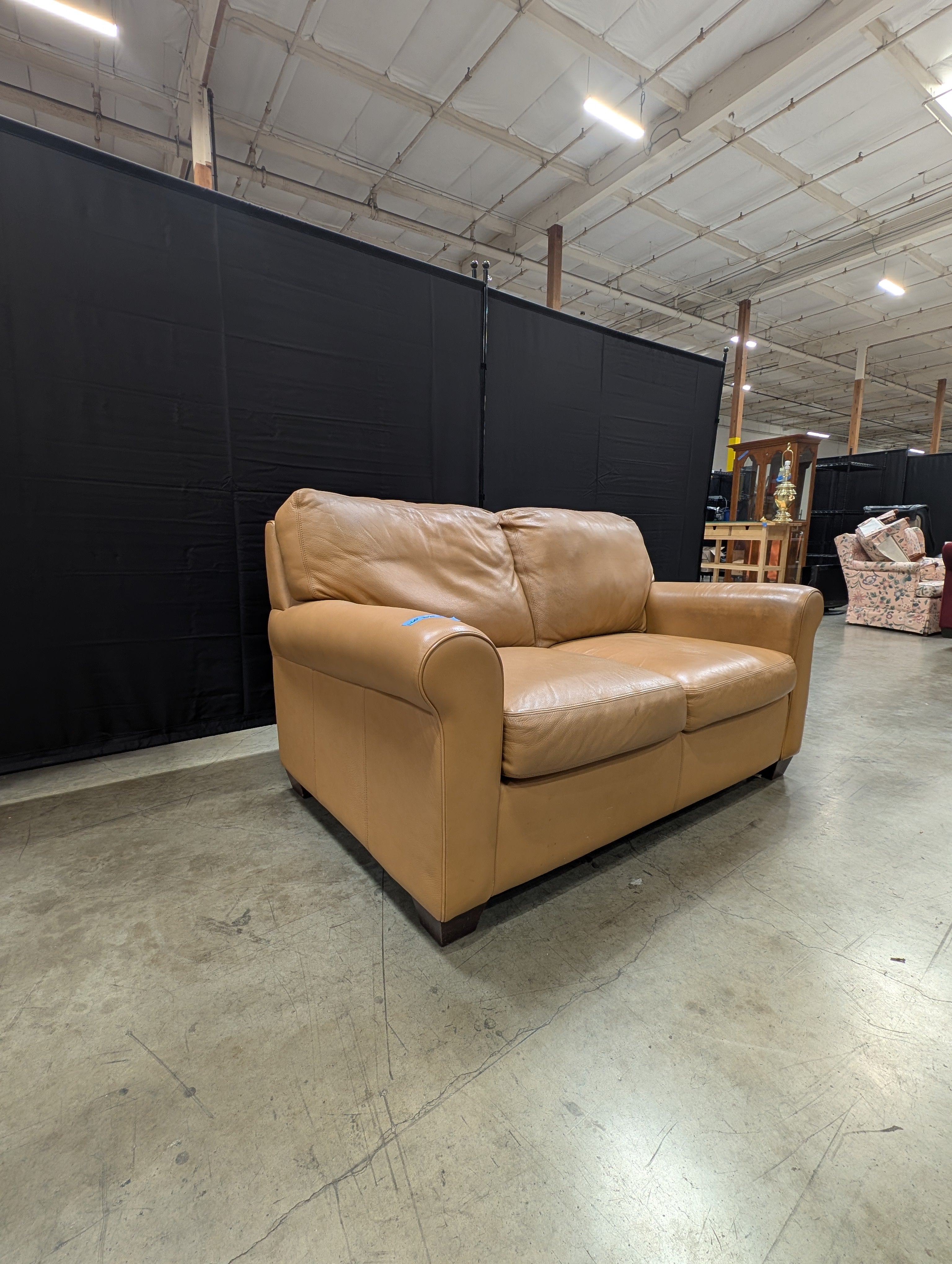 Compact Two-Seater Tan Leather Sofa