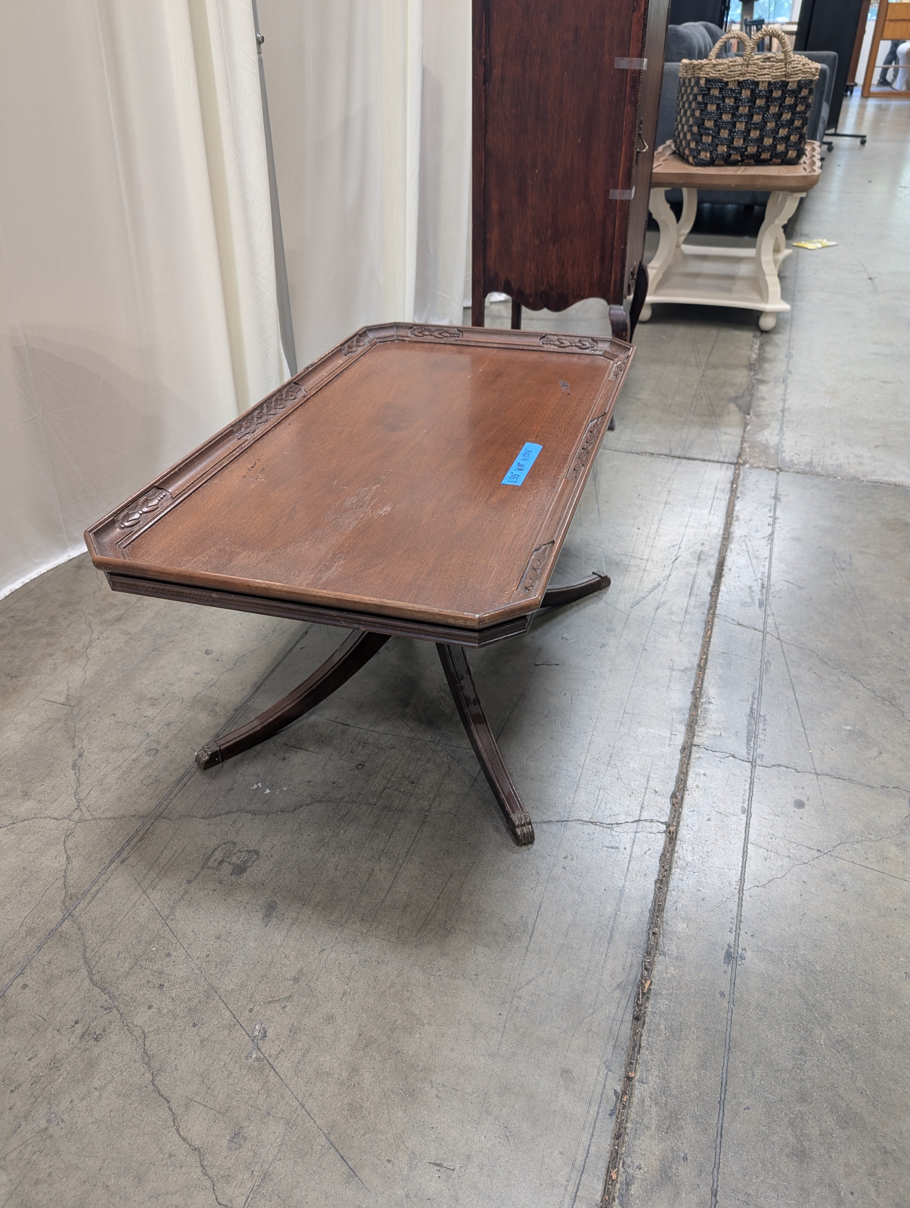 Carved Wood Coffee Table with Glass Insert