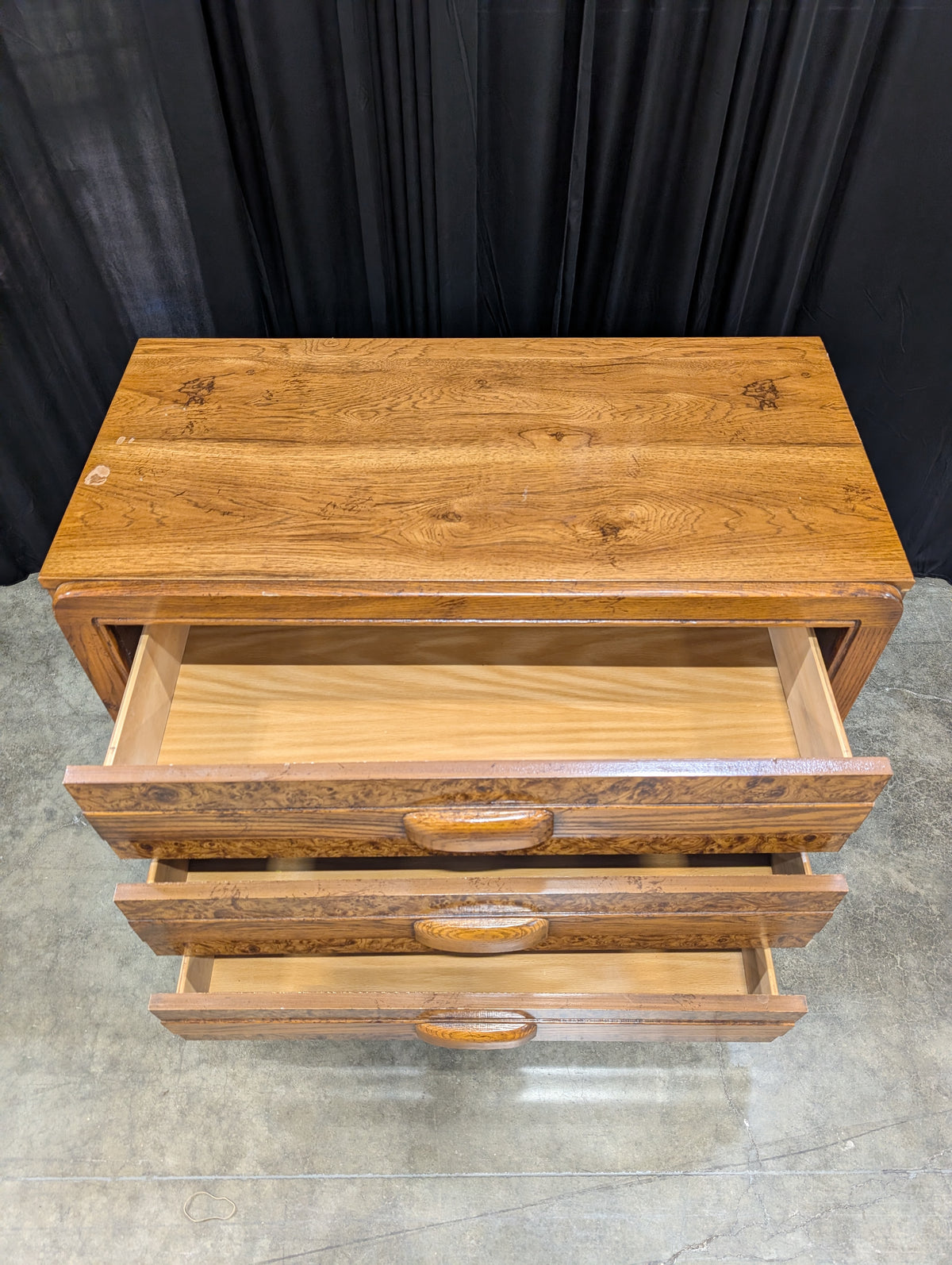 Warm Brown Hardwood Three-Drawer Dresser with Burl Grain Fronts