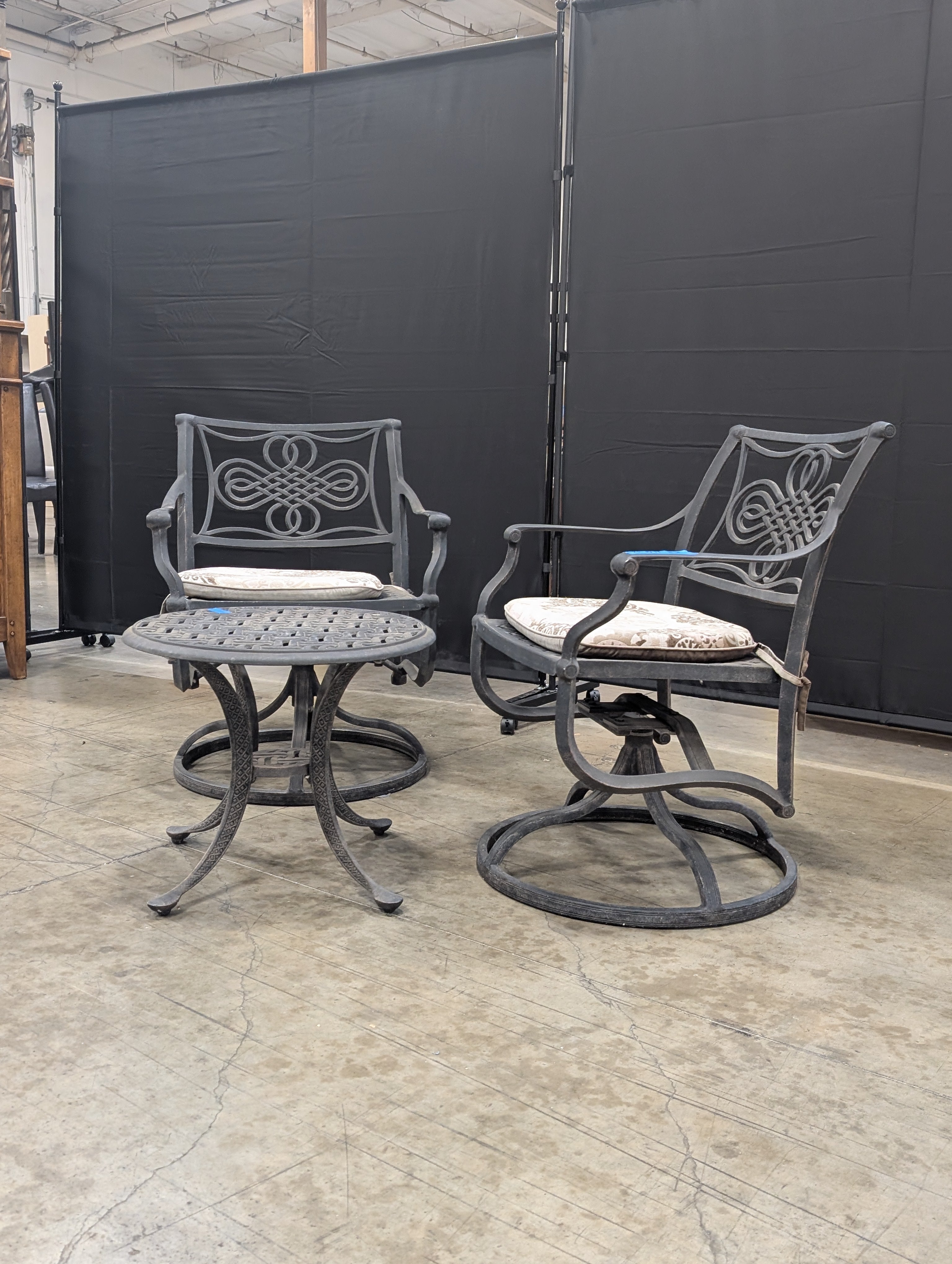 Ornate Cast Metal Outdoor Bistro Set with Swivel Chairs