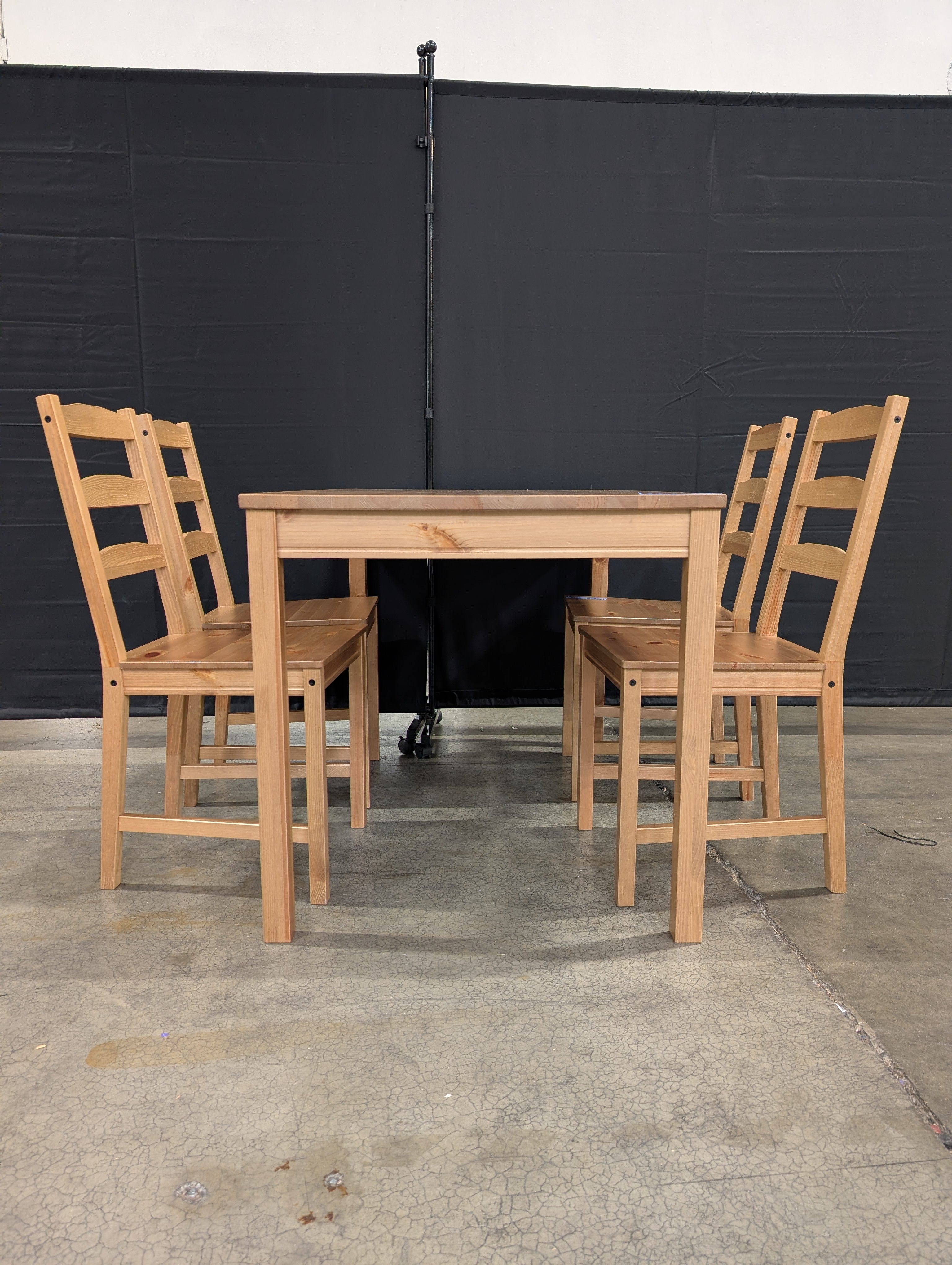 Natural Wood Plank Dining Table with Four Ladder Back Chairs