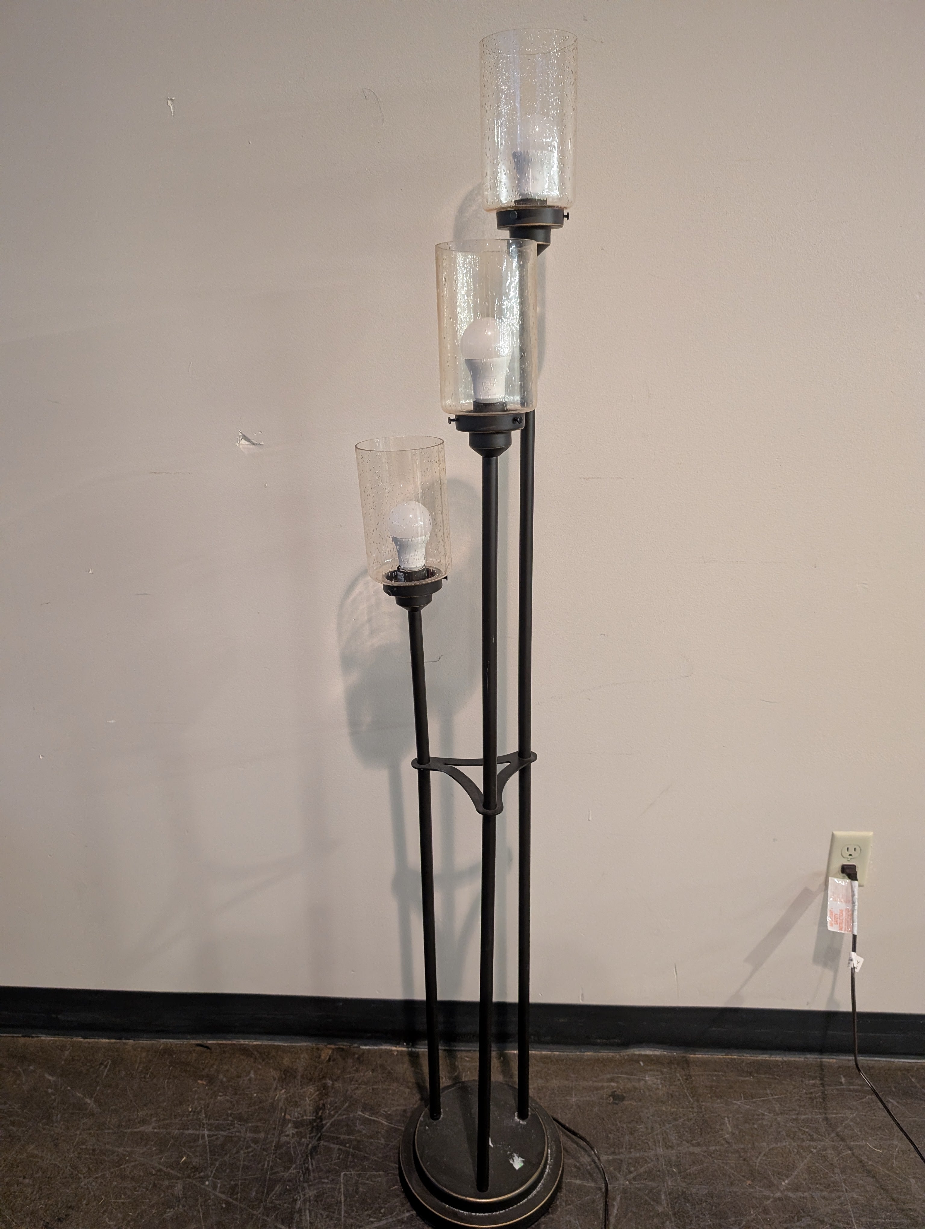 Contemporary Black Metal Three-Light Floor Lamp with Textured Glass Shades