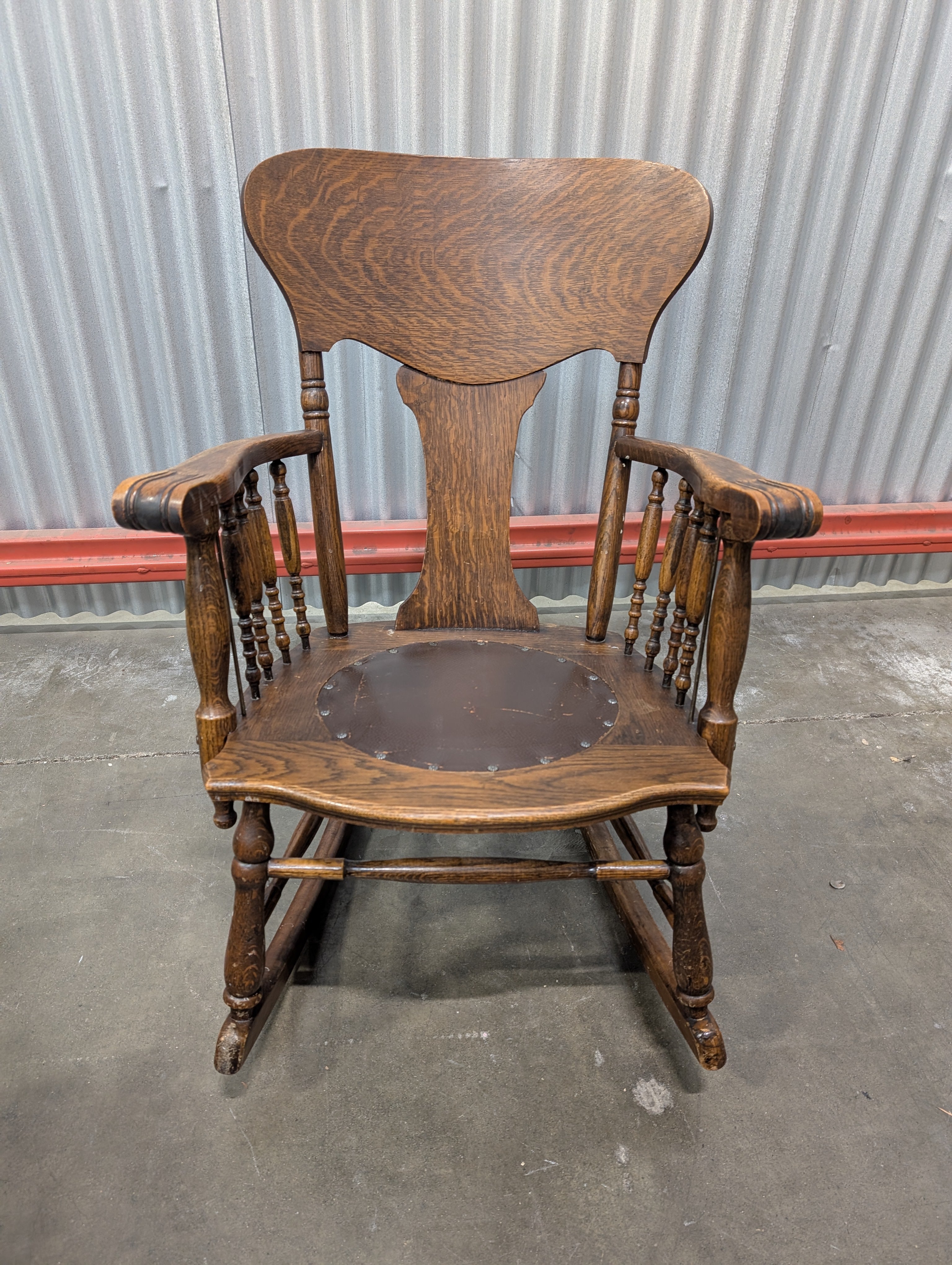Antique Dark Wood Rocking Chair with Leather Seat