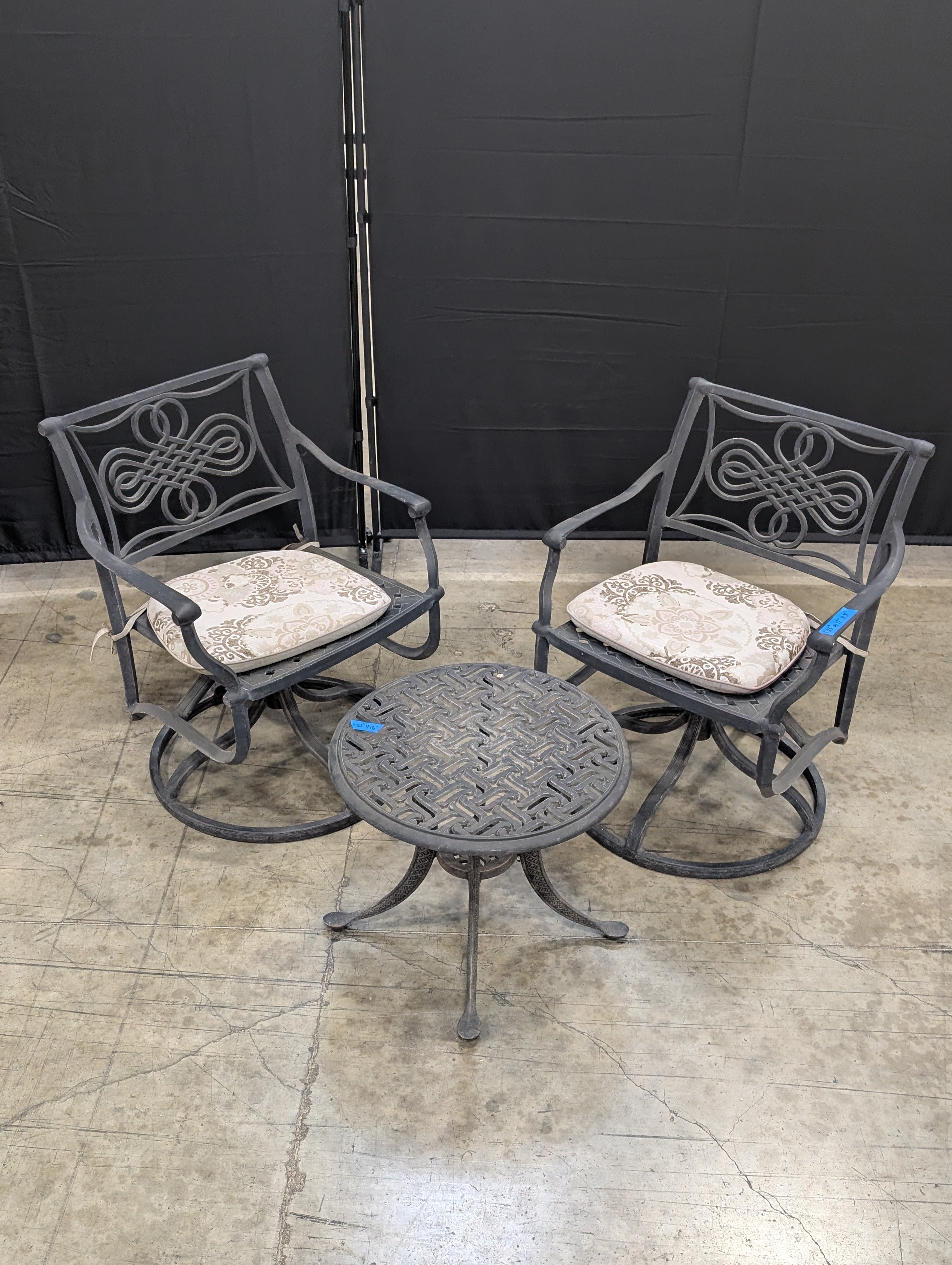 Ornate Cast Metal Outdoor Bistro Set with Swivel Chairs