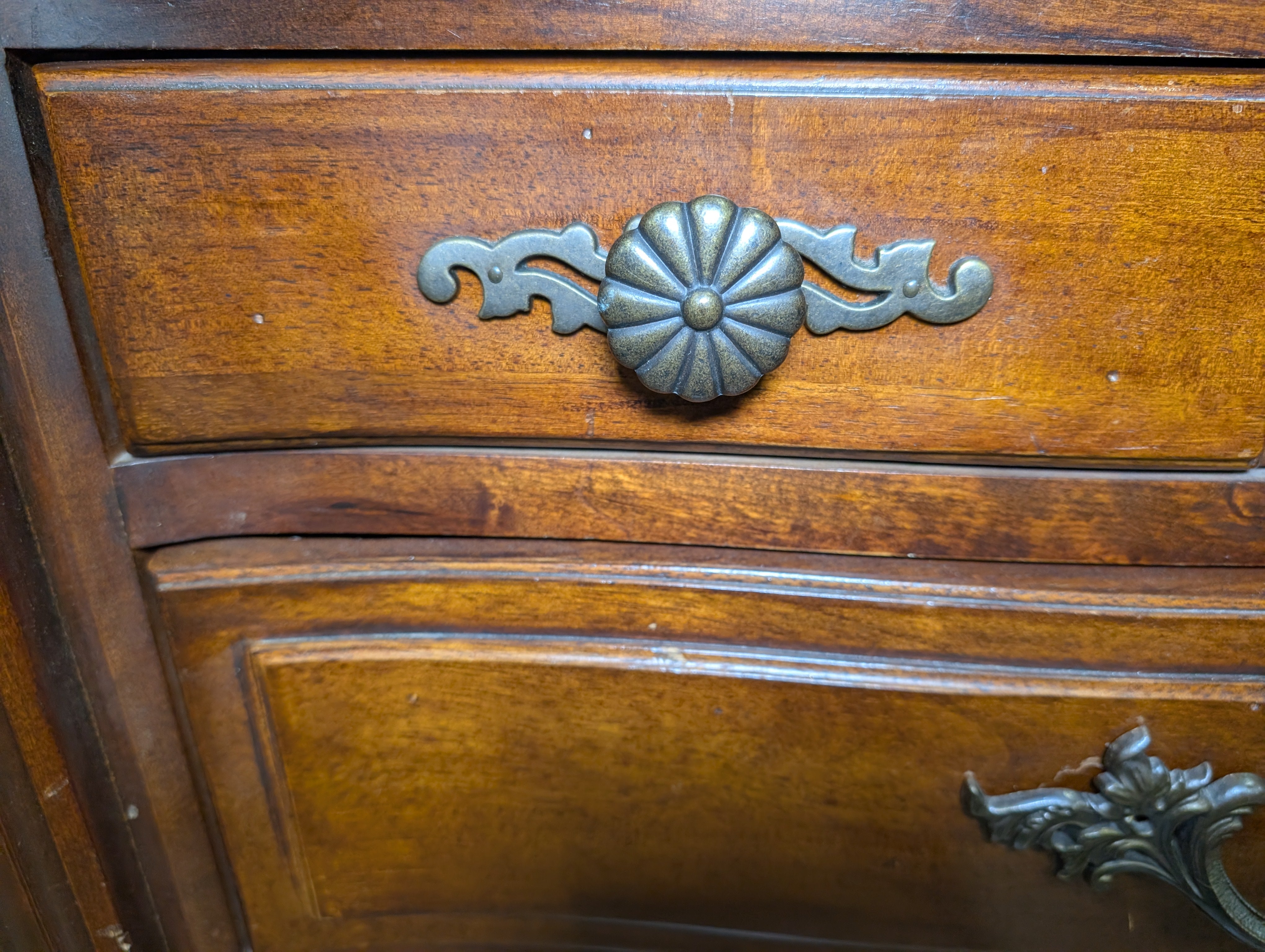 Traditional Cherry Stained Wood Dresser with Ornate Hardware