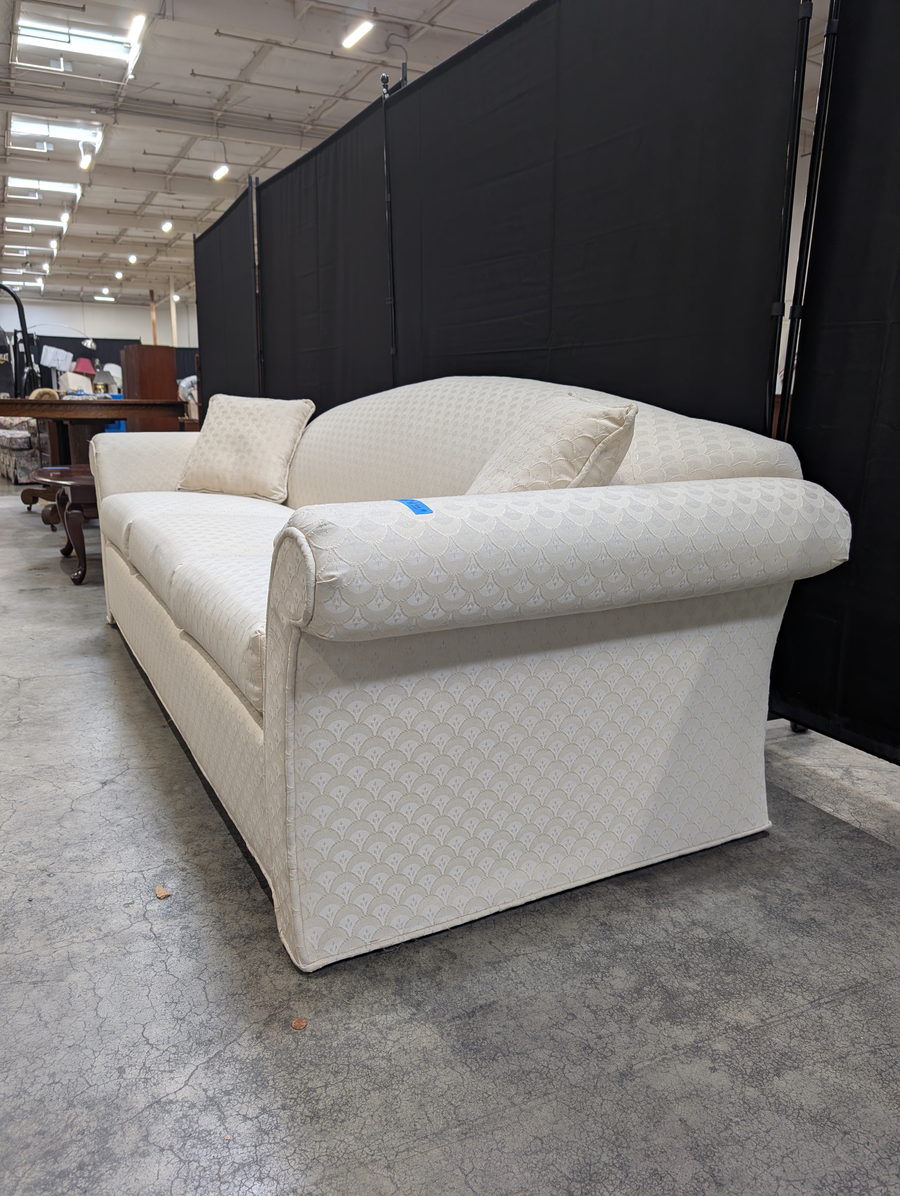 Cream Patterned Upholstered Sofa with Rolled Arms