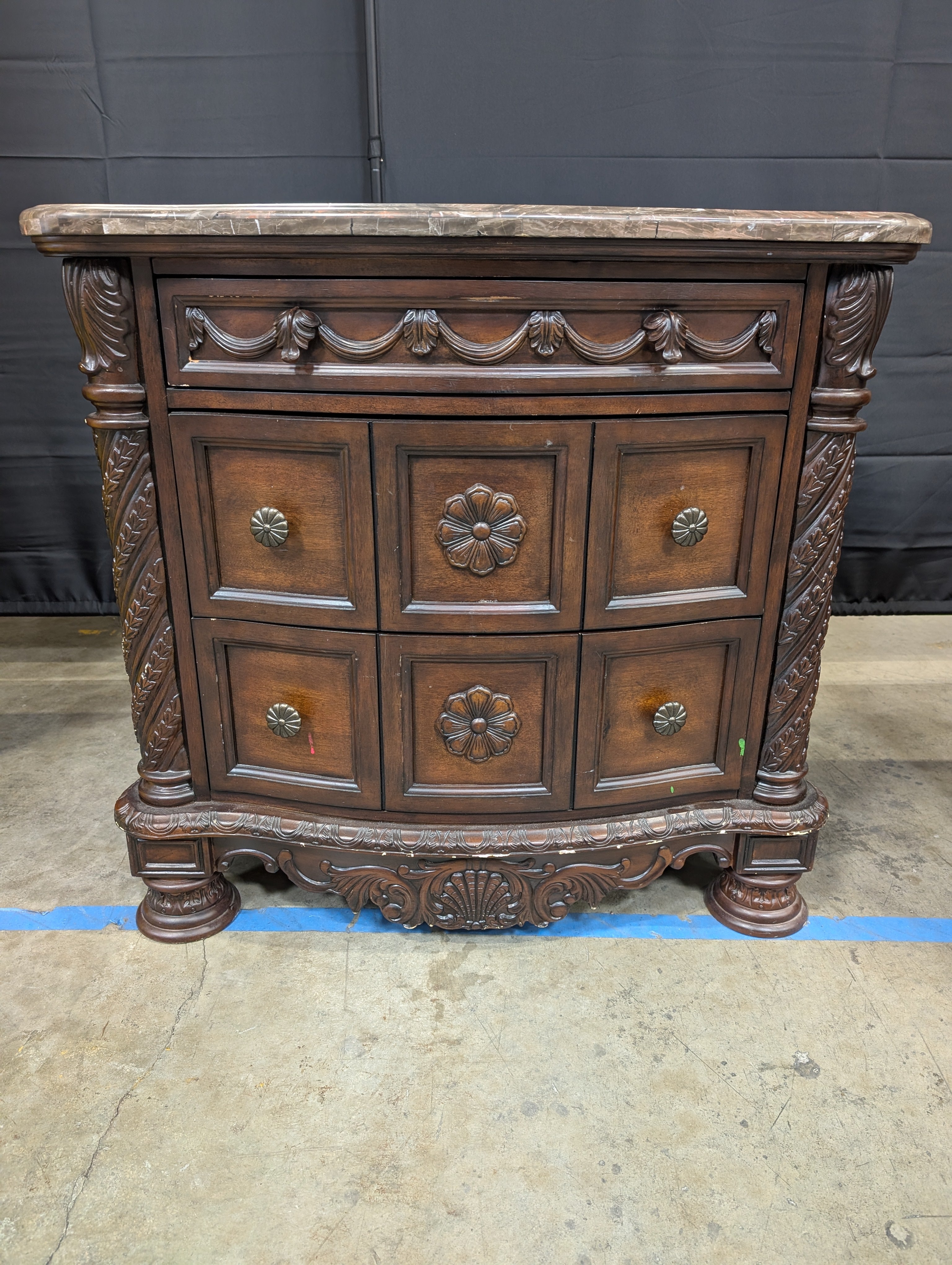 Carved Dark Wood Nightstand with Marble Top