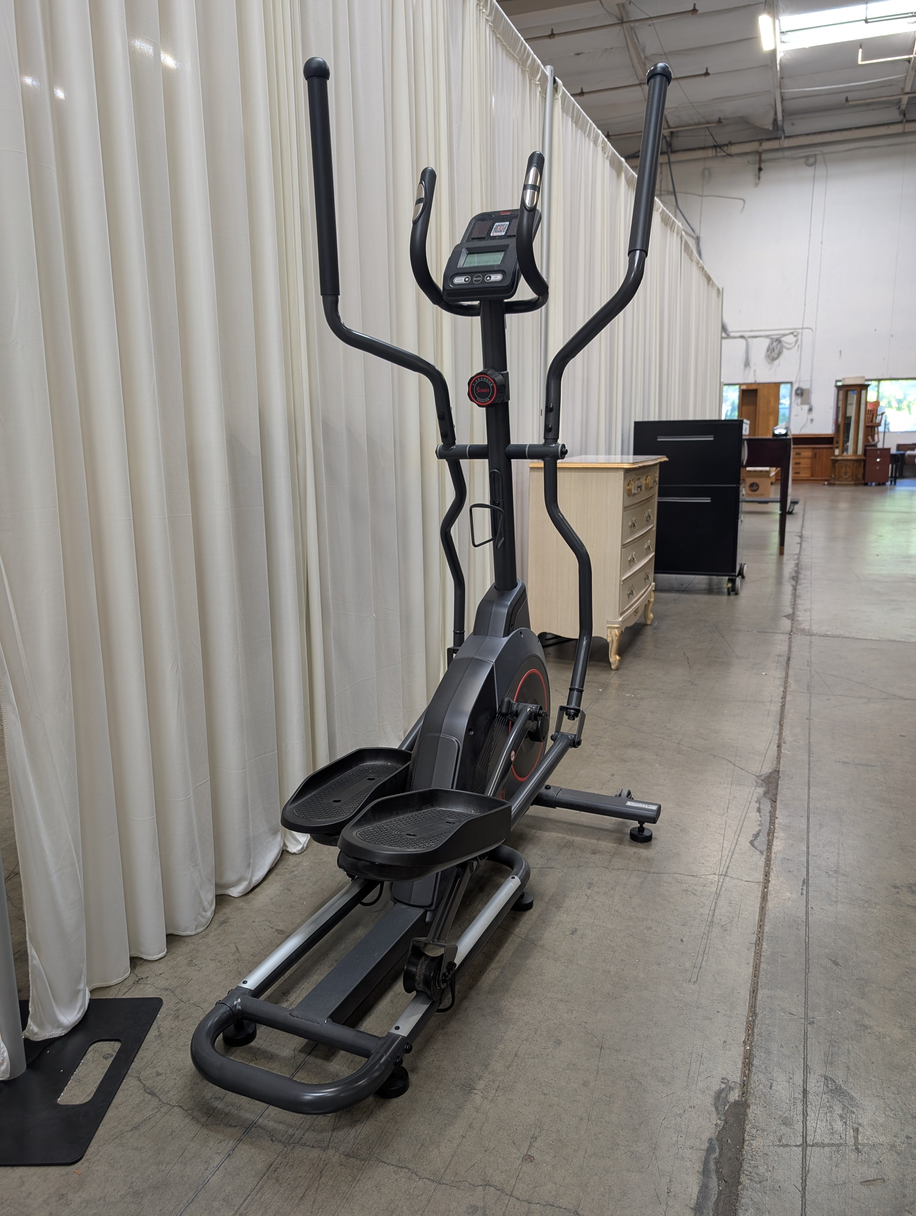 Black Magnetic Elliptical Trainer with Red Accents