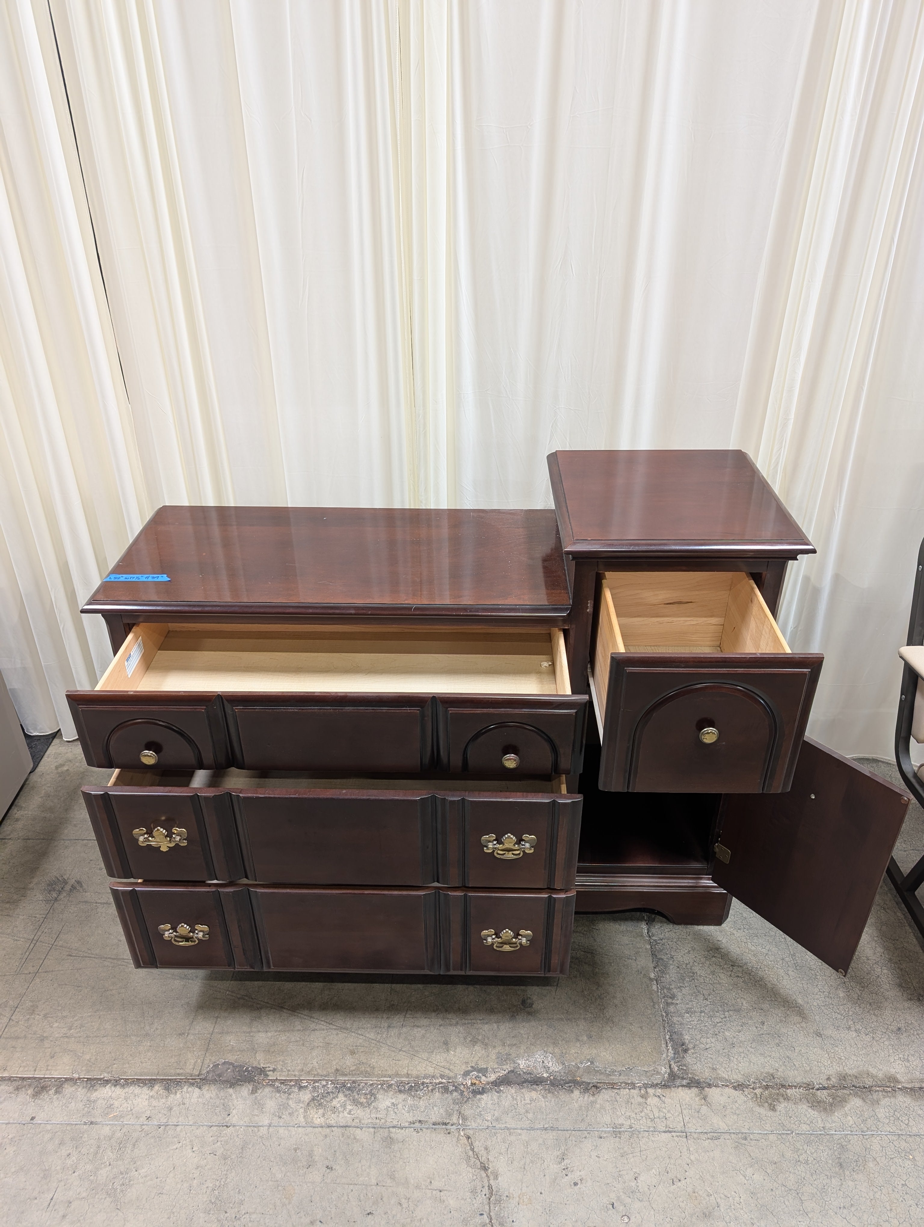 Traditional Dark Wood Dresser with Ornate Hardware