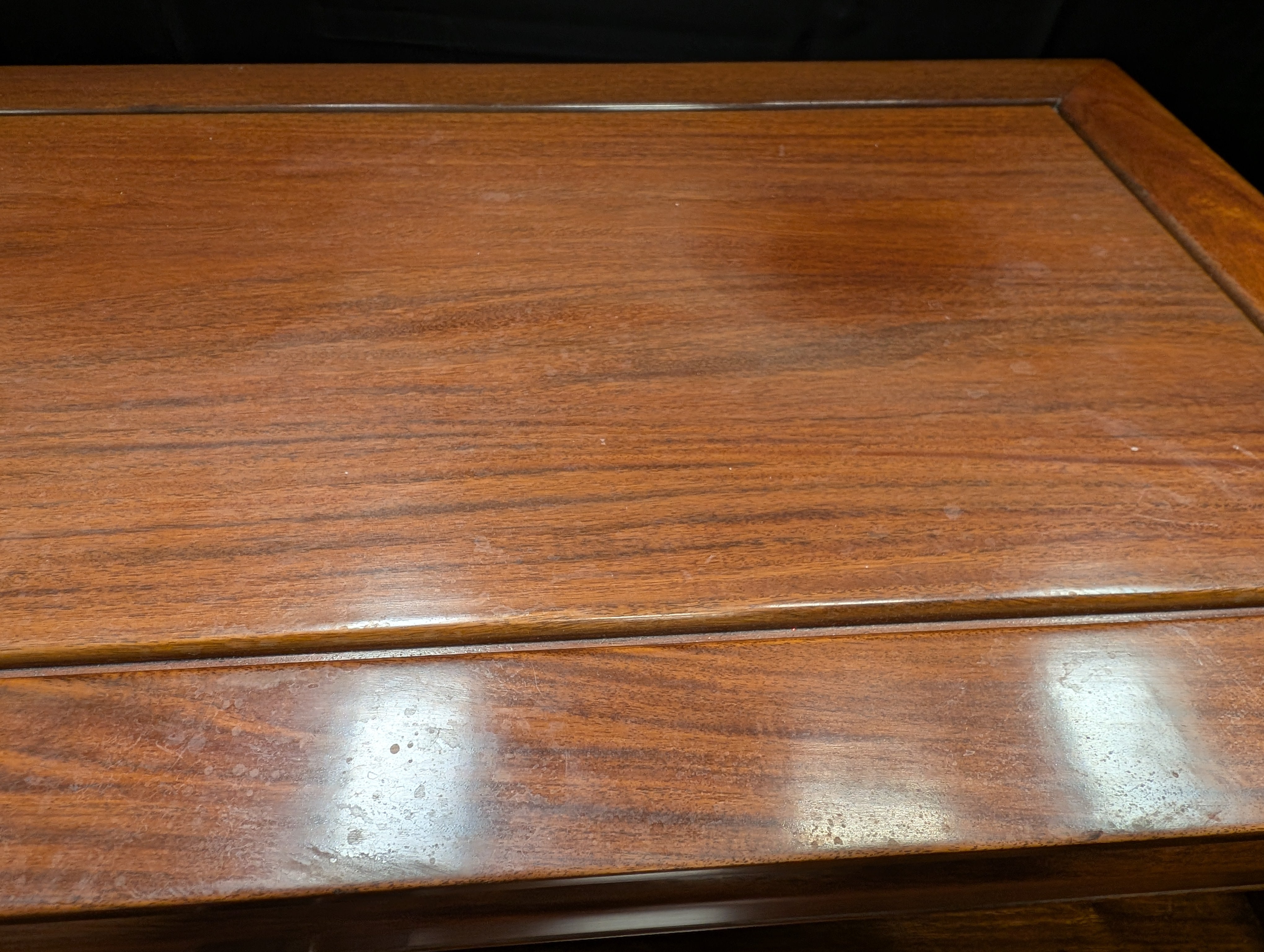 Rich Toned Wooden Sideboard with Carved Accents