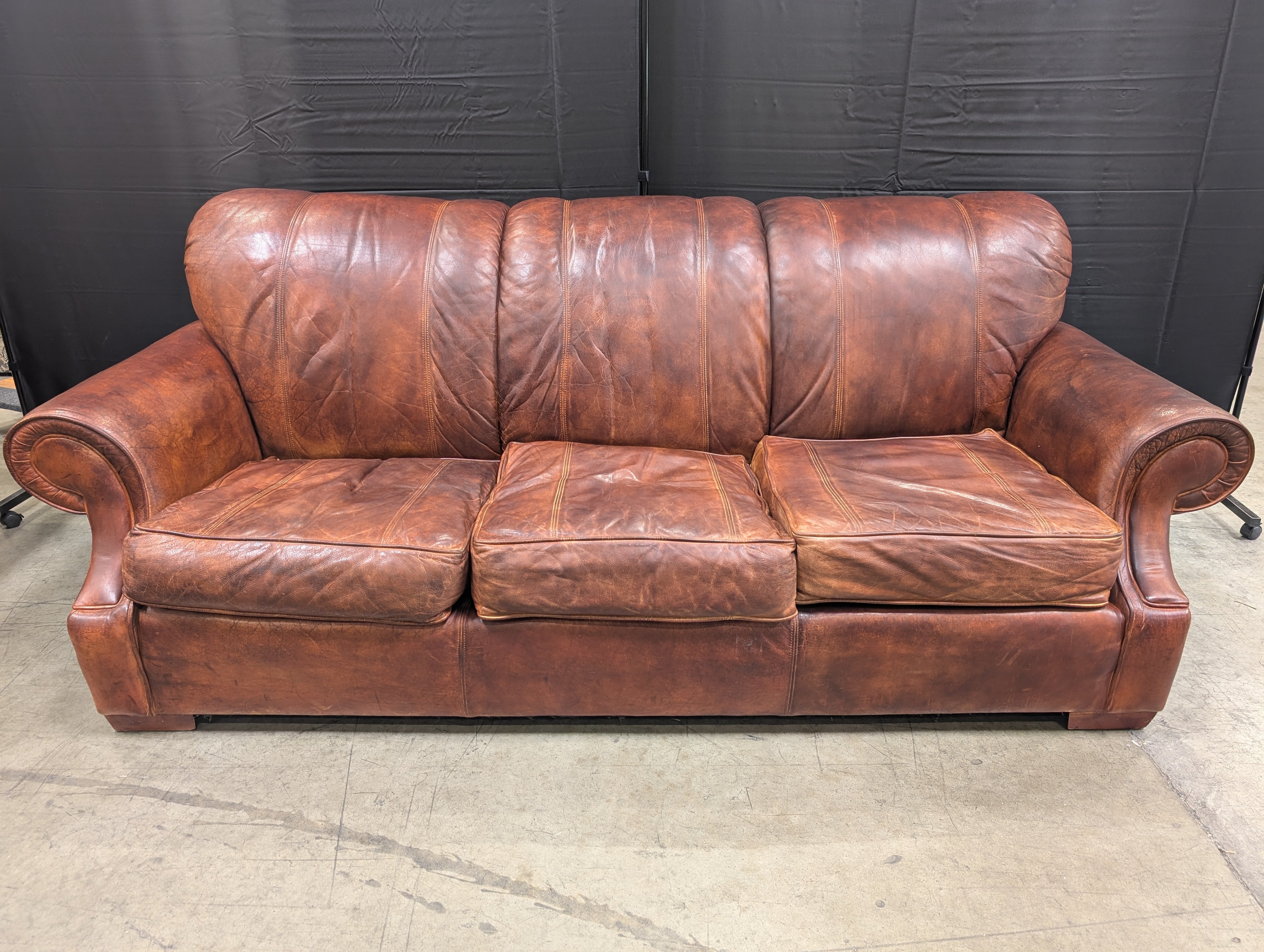 Classic Brown Leather Three-Seater Sofa with Rolled Arms