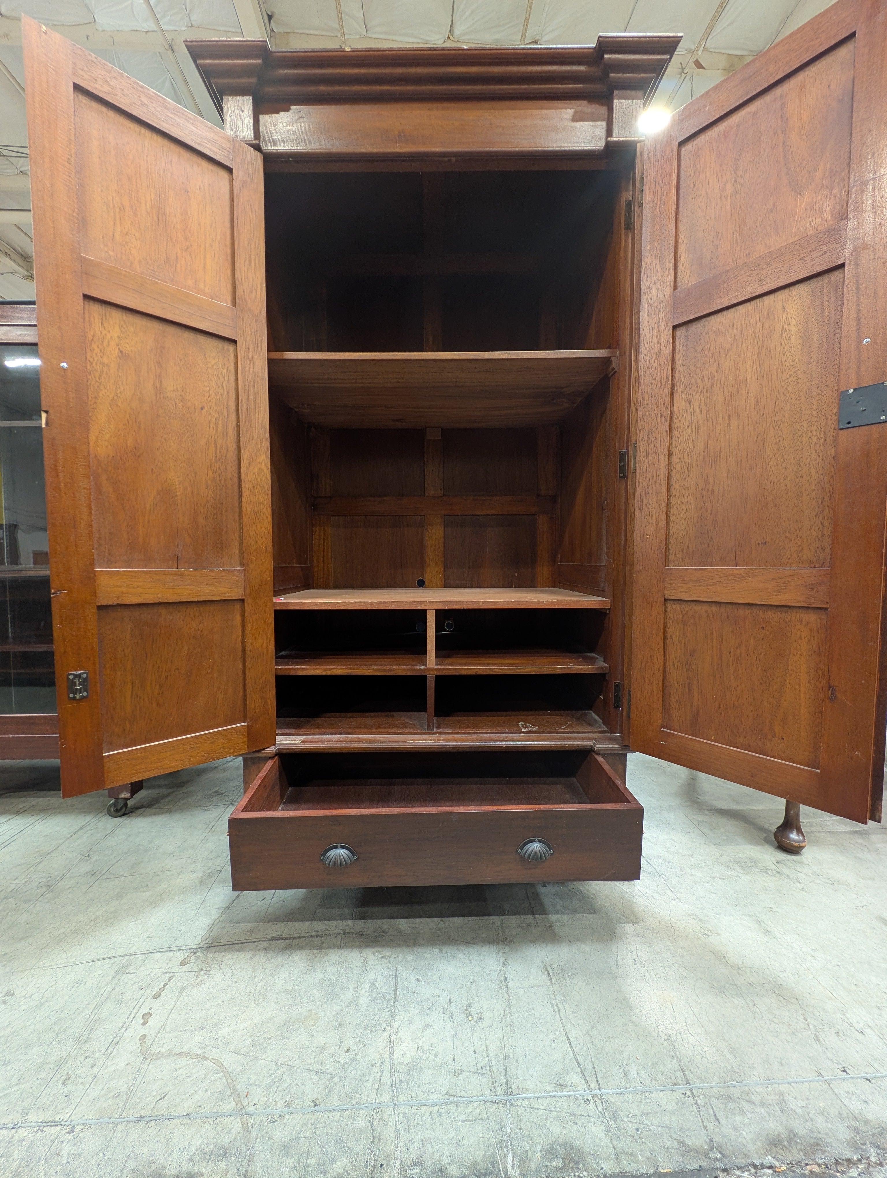 Stately Dark Wood Paneled Armoire with Drawer