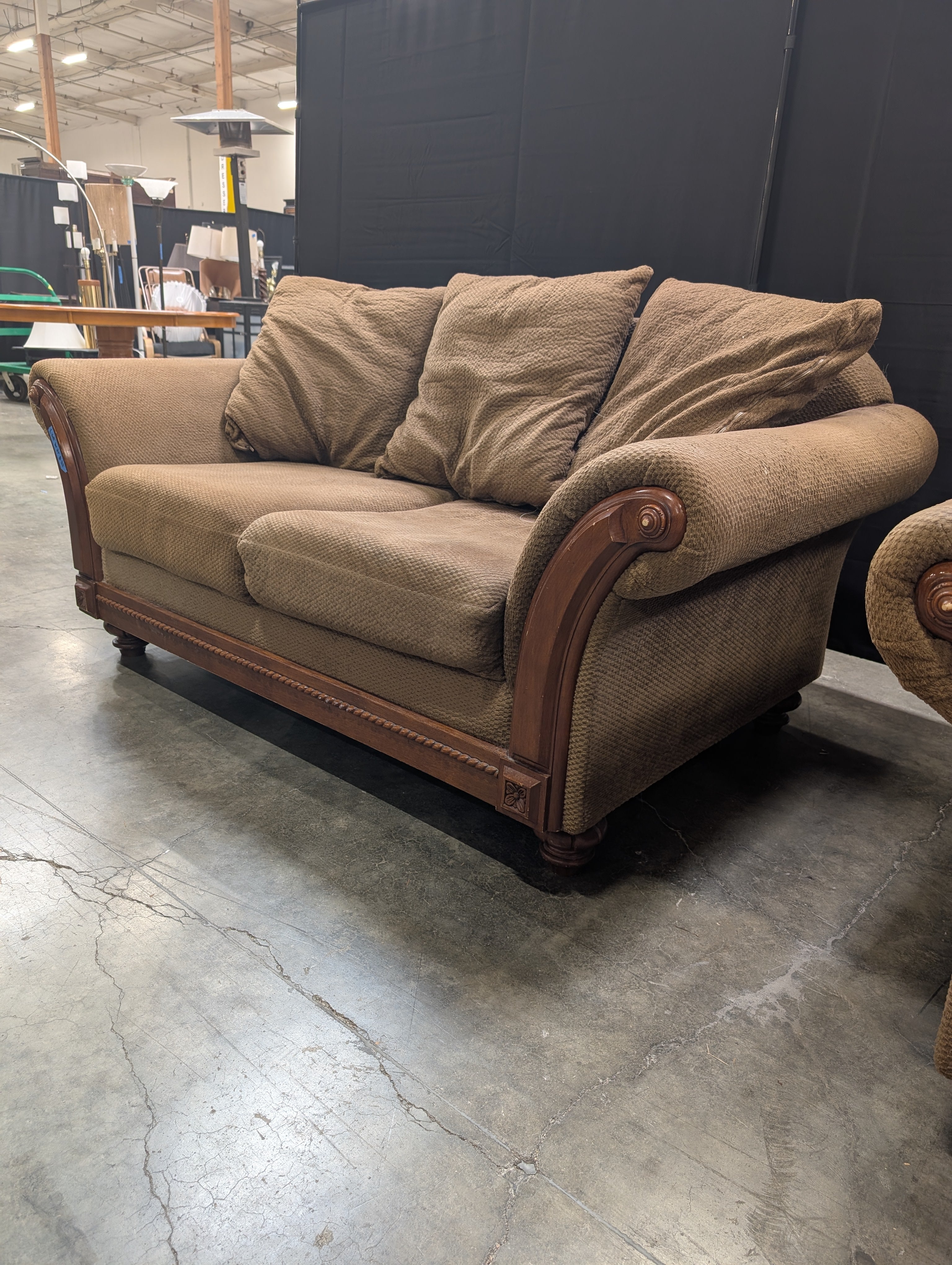 Brown Textured Fabric Loveseat with Wood Trim