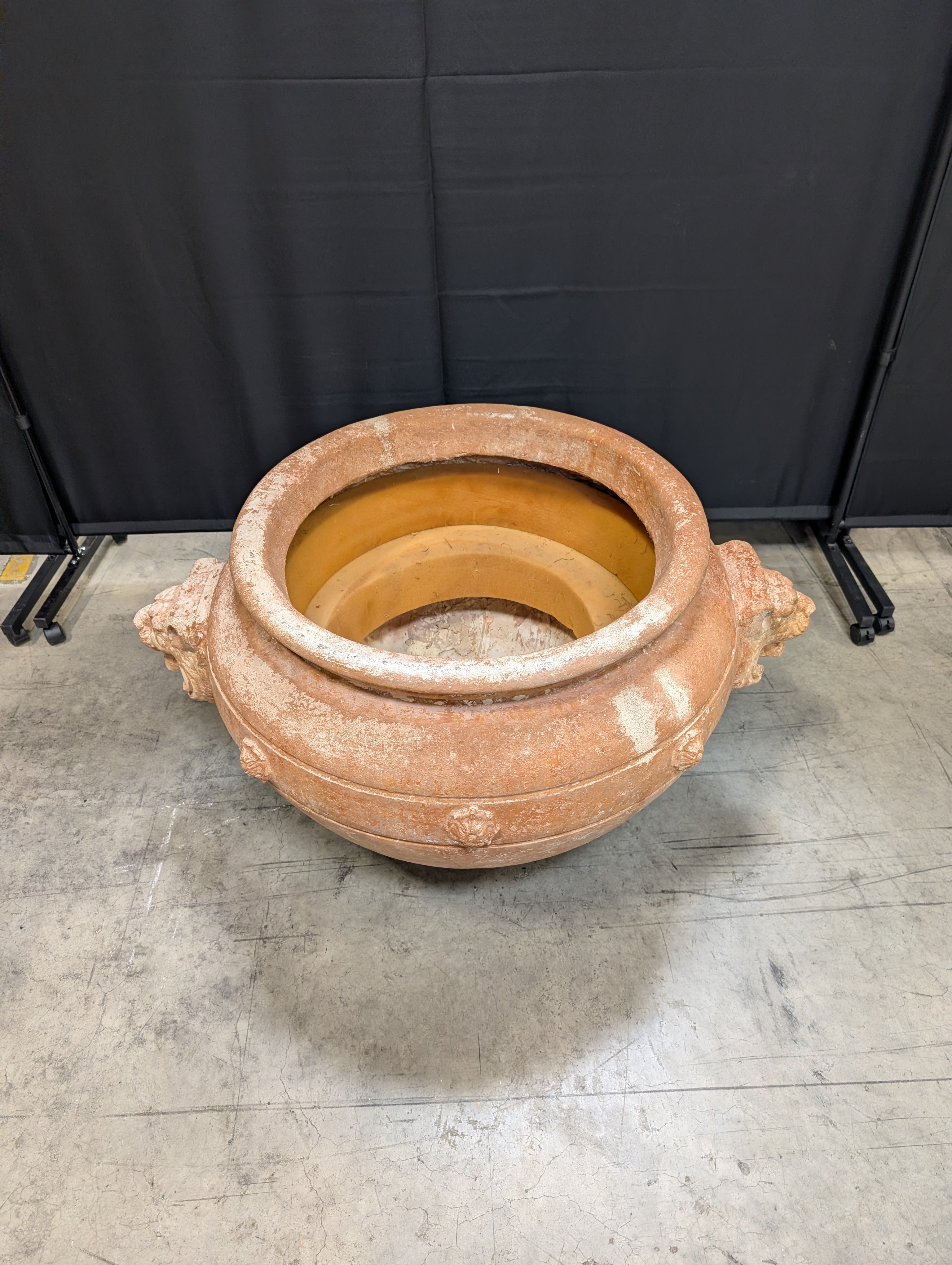 Ornate Terracotta-Style Planter with Lion Head Accents