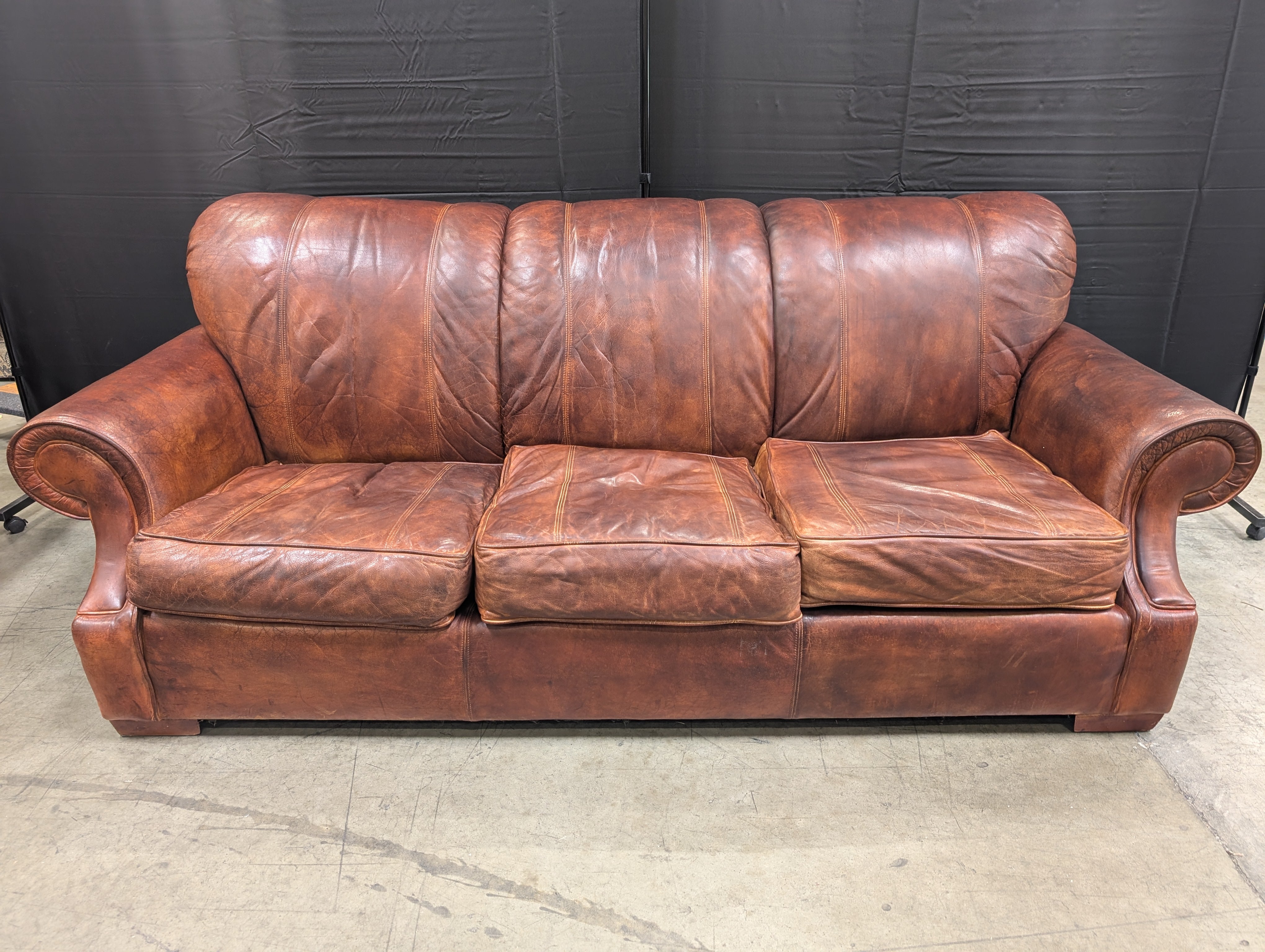 Classic Brown Leather Three-Seater Sofa with Rolled Arms