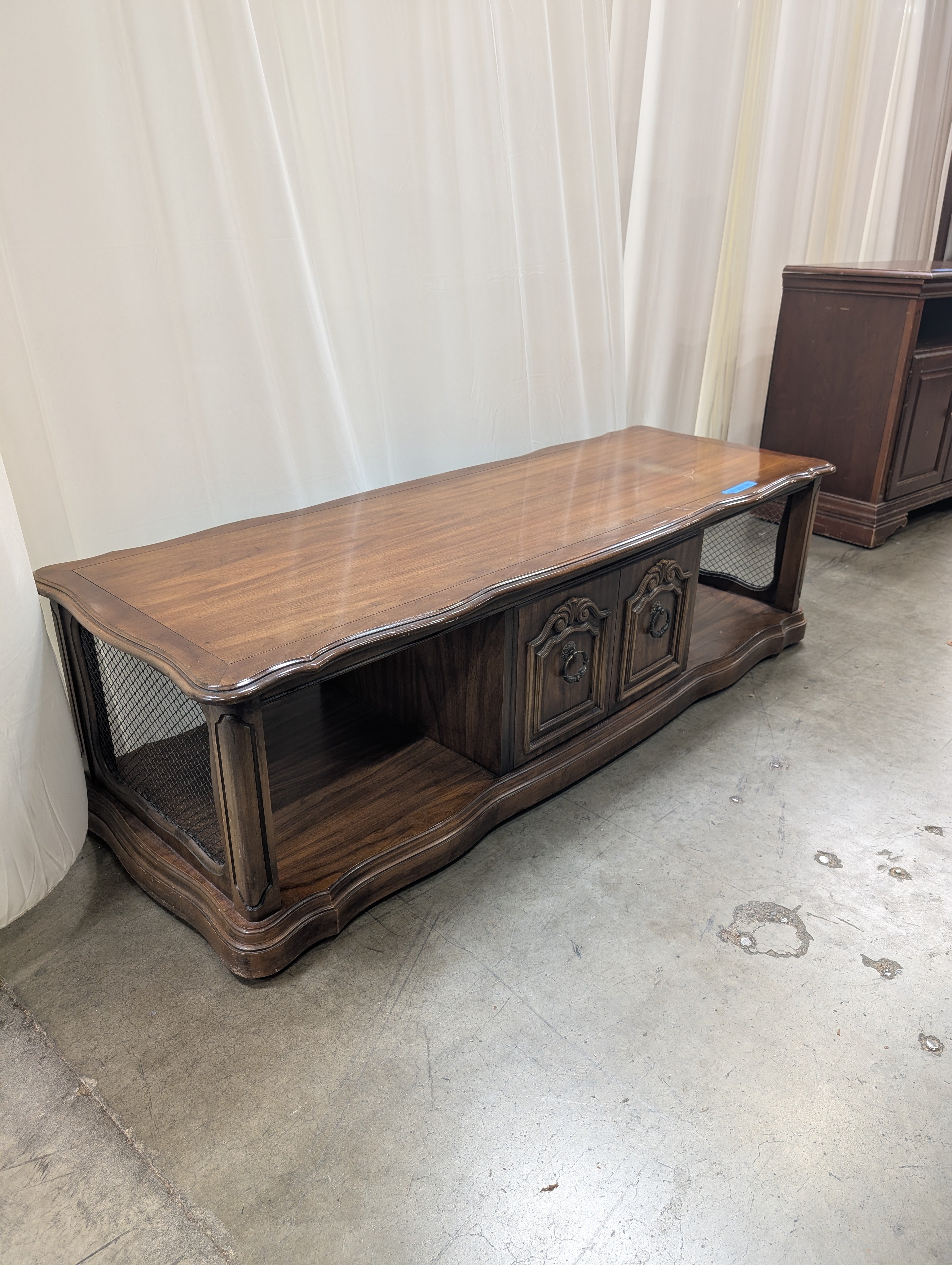 Traditional Dark Wood Coffee Table with Ornate Hardware