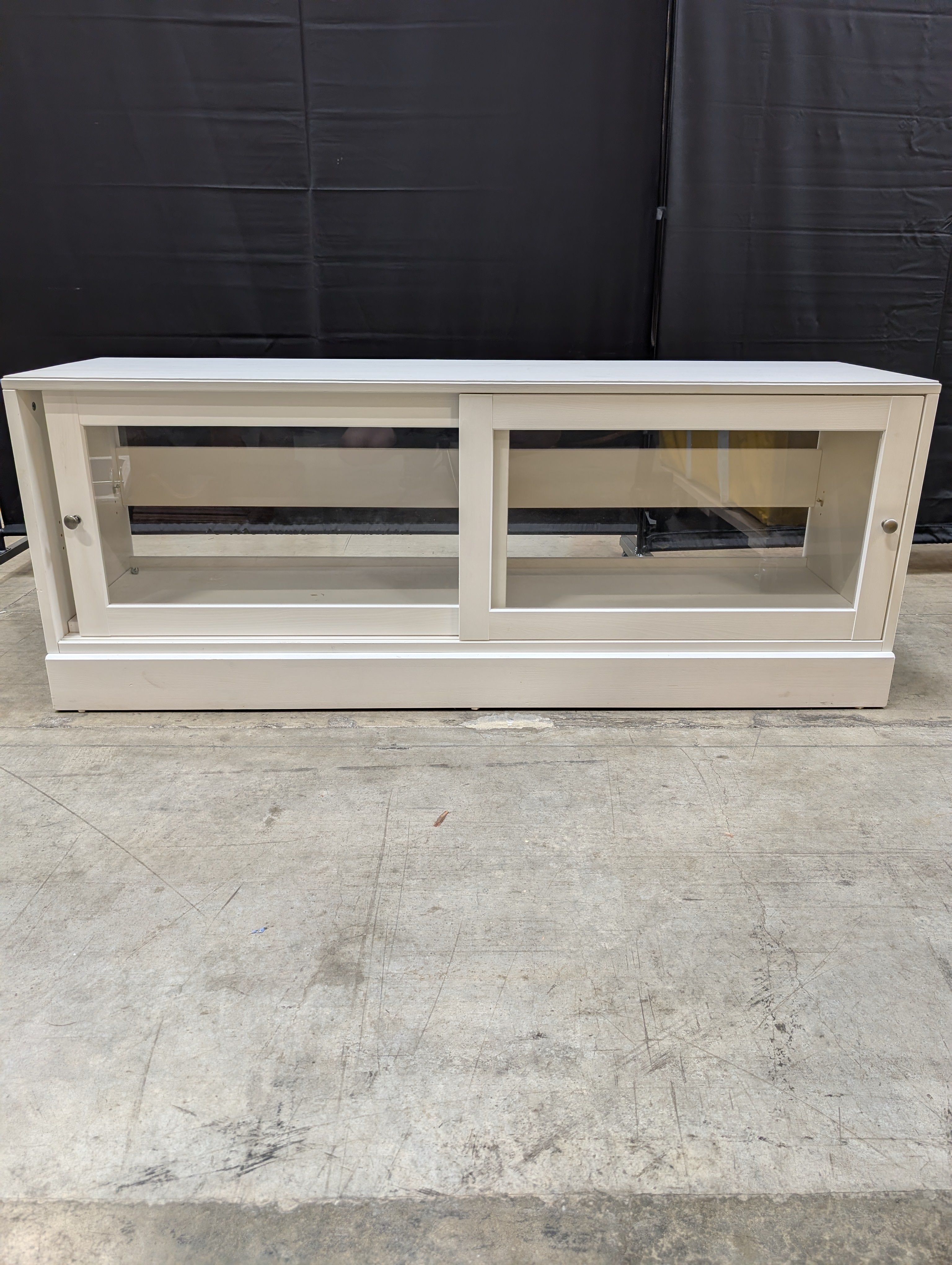 White Media Console with Sliding Glass Door
