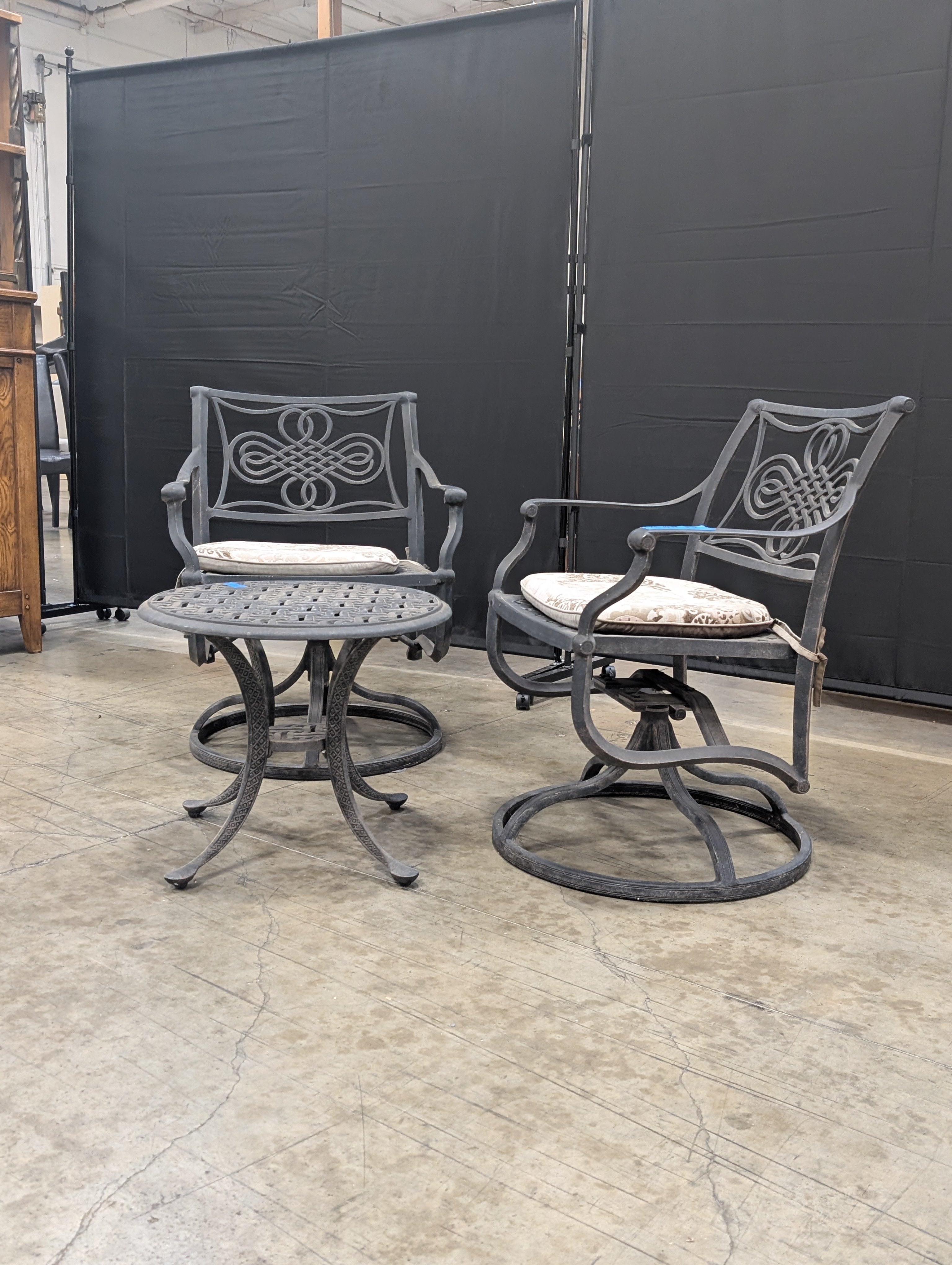 Ornate Cast Metal Outdoor Bistro Set with Swivel Chairs