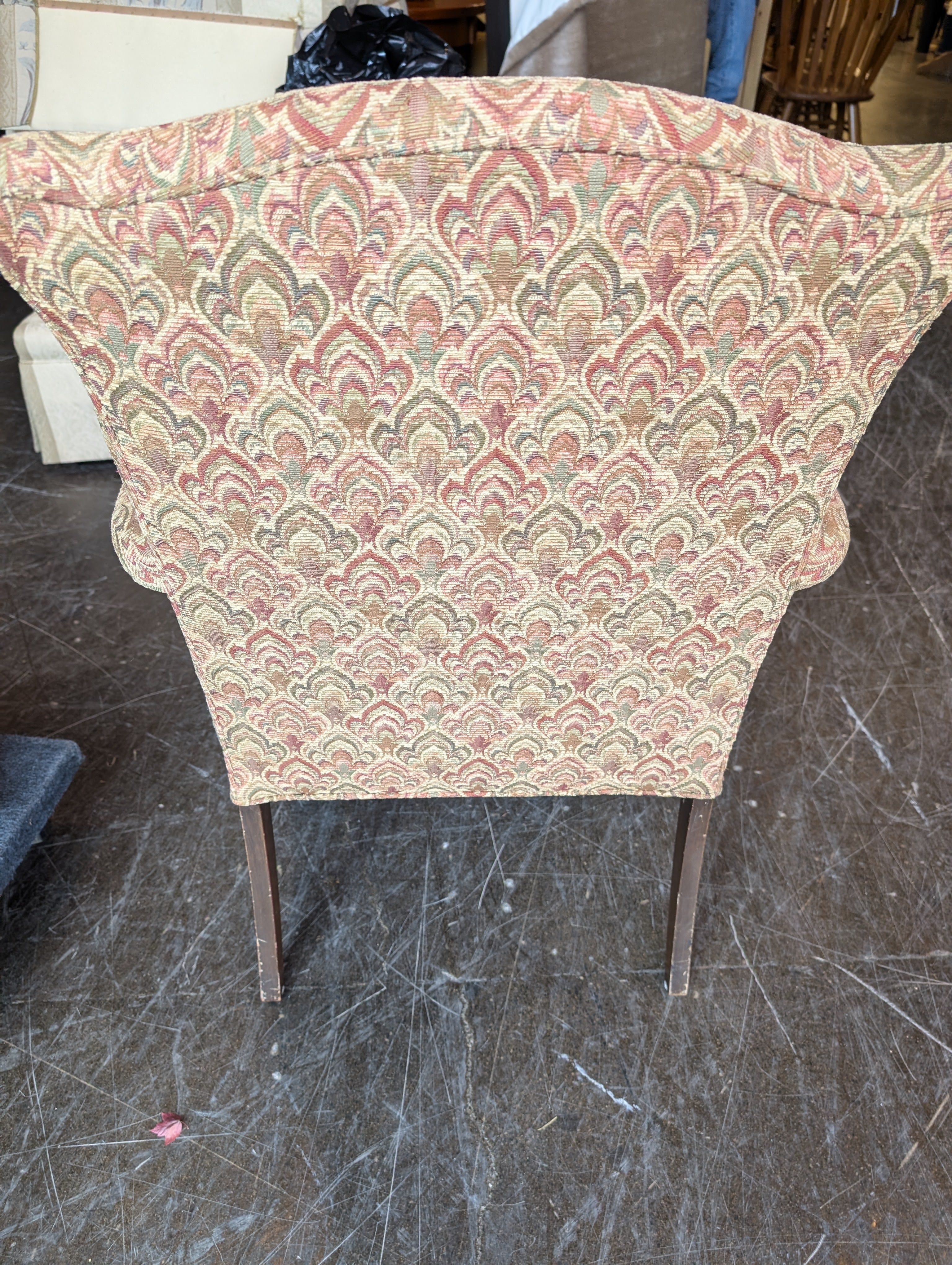 Traditional Upholstered Armchair with Carved Wood Accents