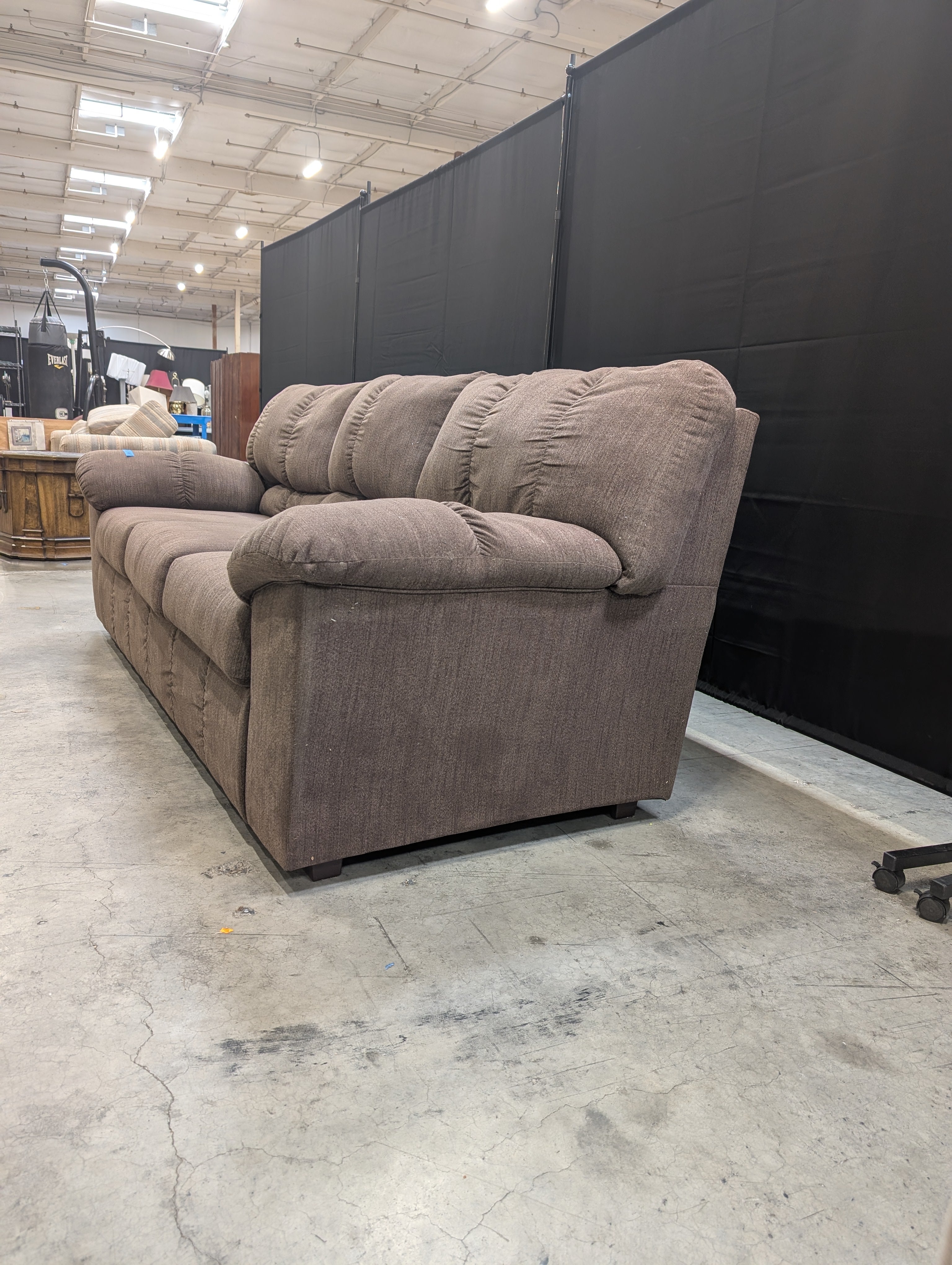 Brown Fabric Ashley Furniture Three-Seat Sofa