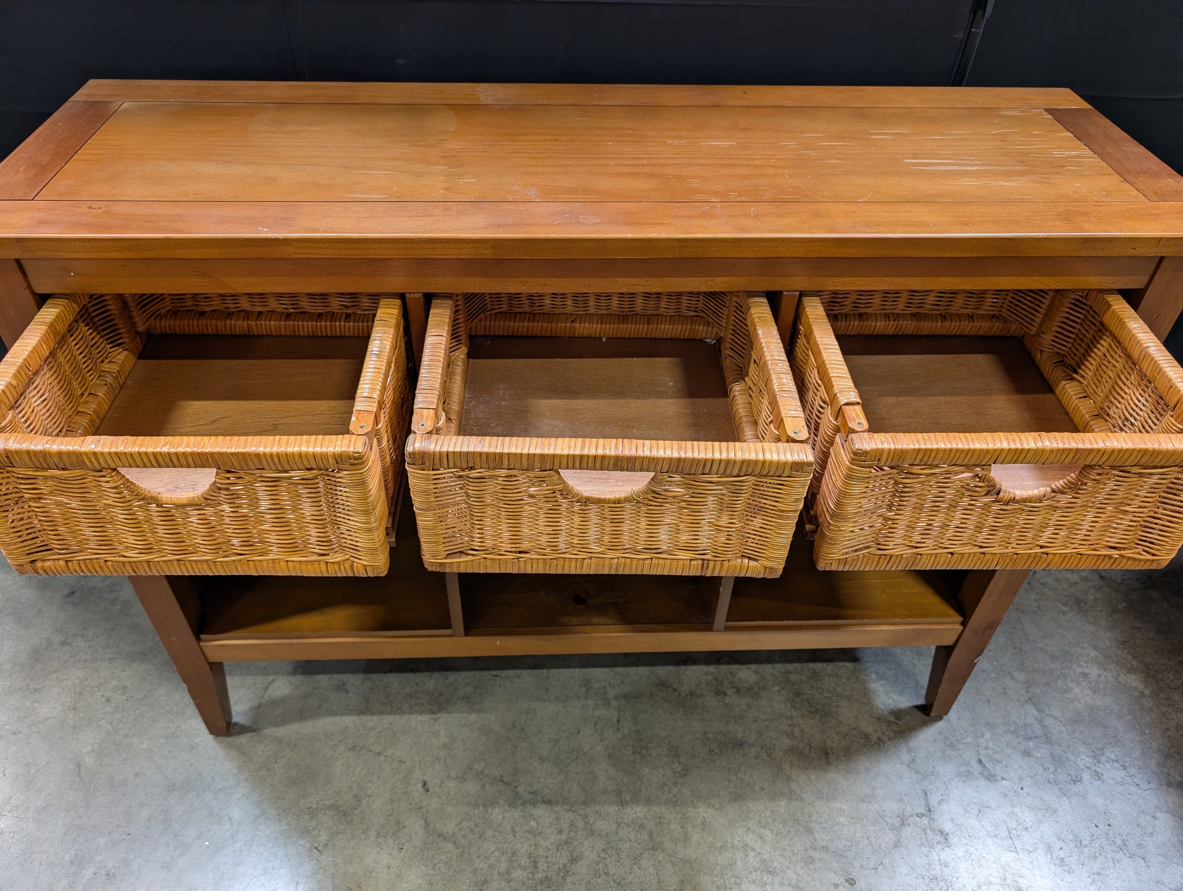 Wooden Console Table with Wicker Baskets and Open Shelves