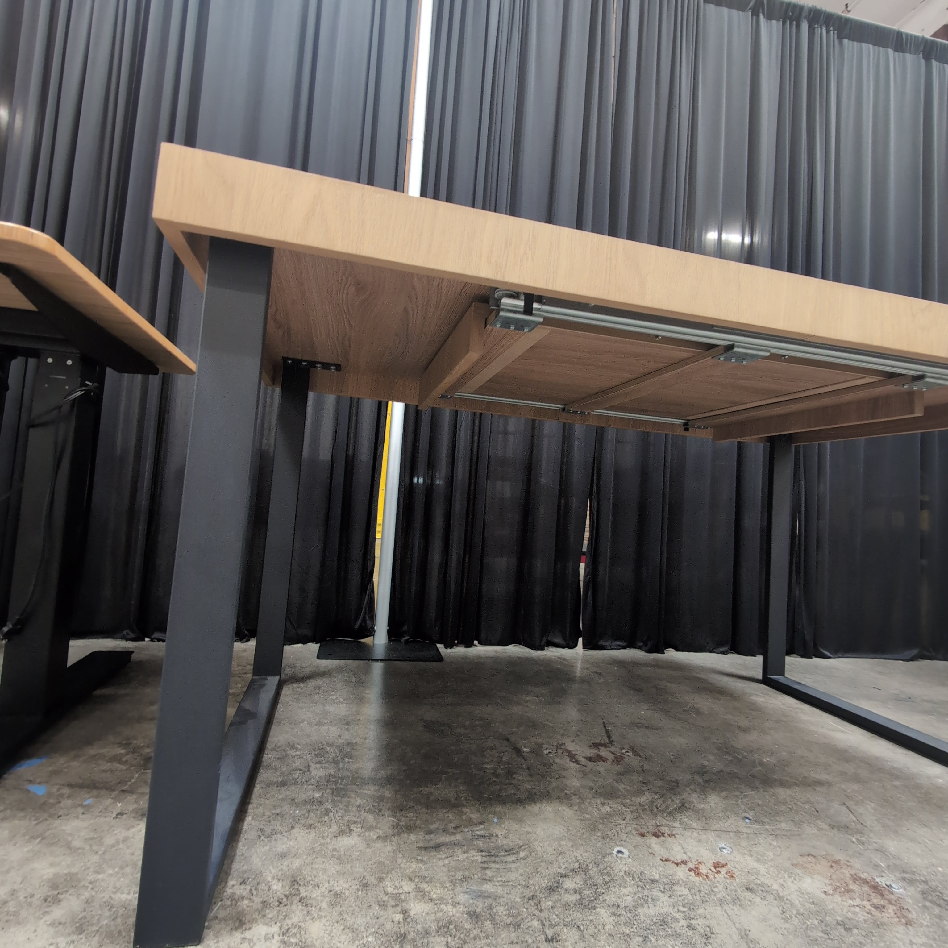 Modern Natural Wood Tone Console Table with Dark Metal Legs