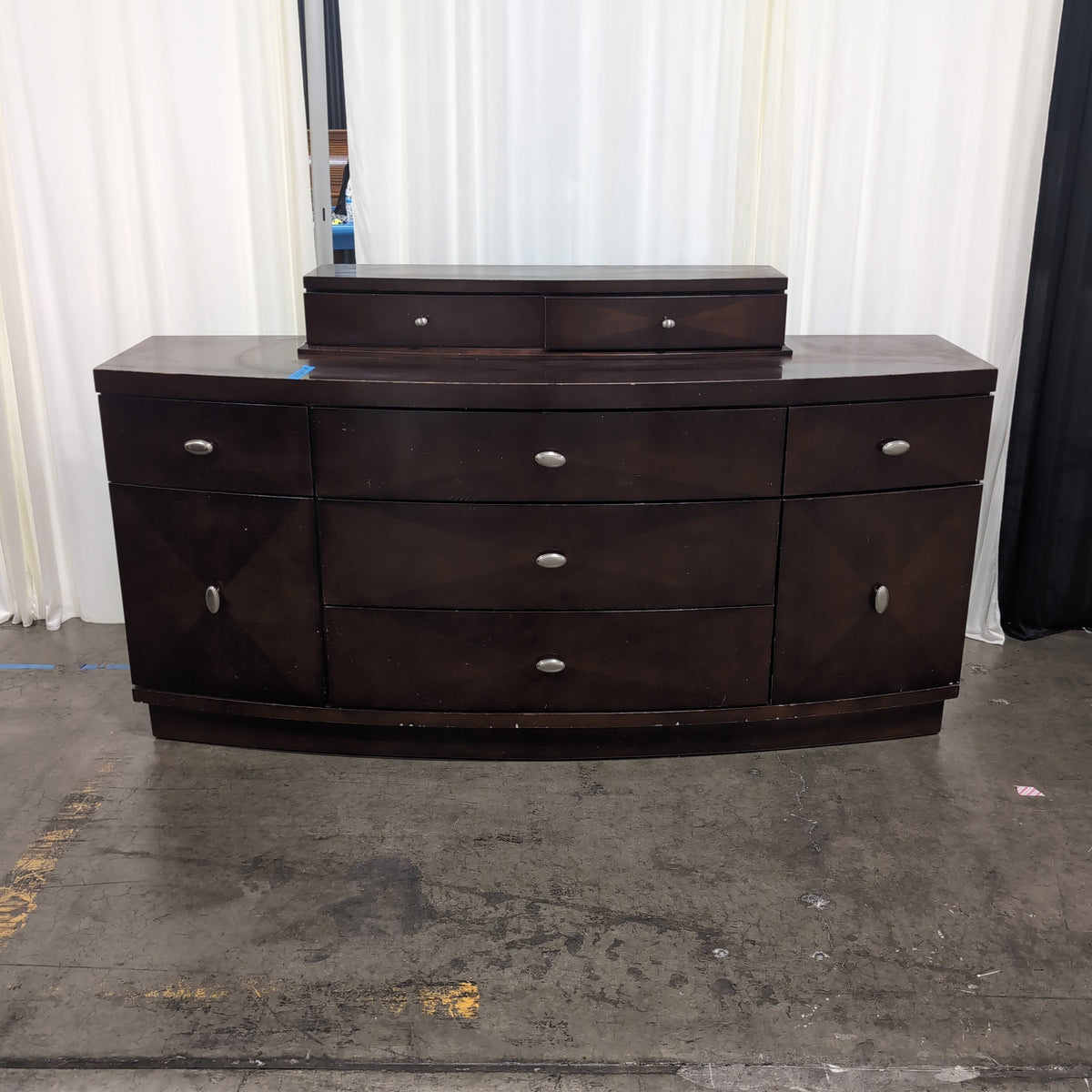 Dark Brown Curved Front Seven-Drawer Dresser