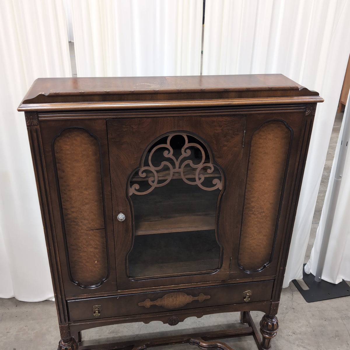 Ornate Dark Wood China Cabinet with Scrollwork