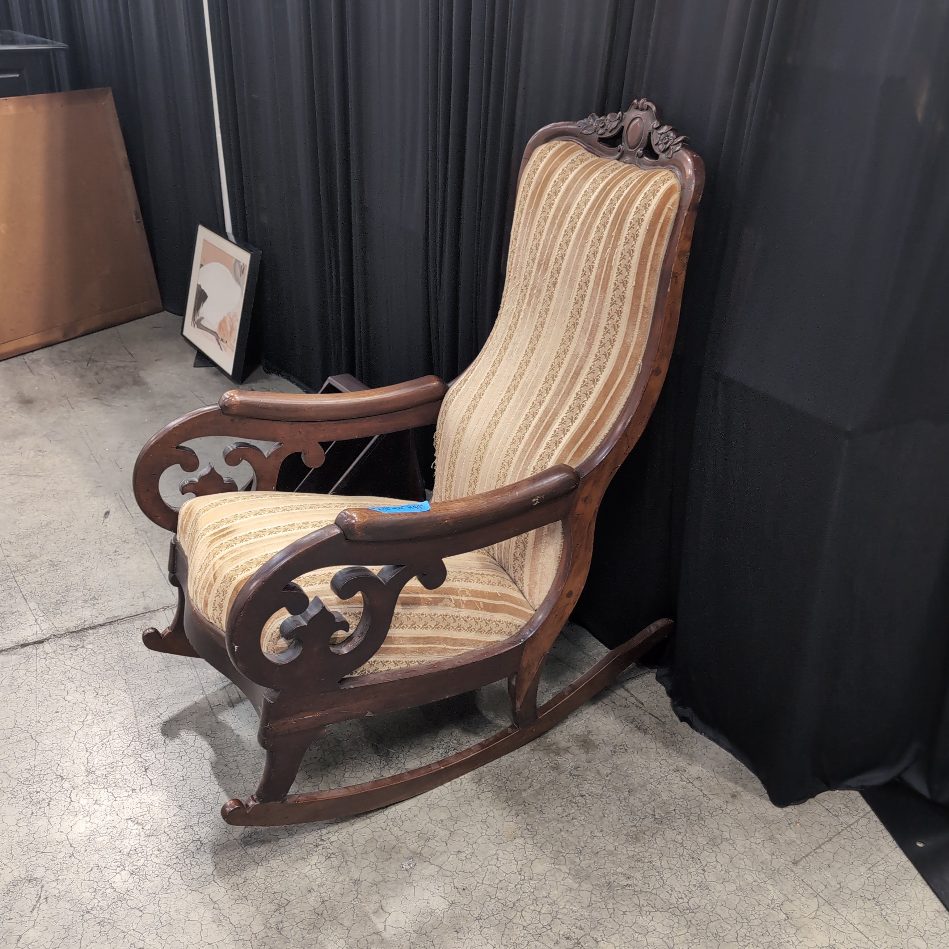 Ornate Carved Wood Upholstered Armchair with Floral Stripes