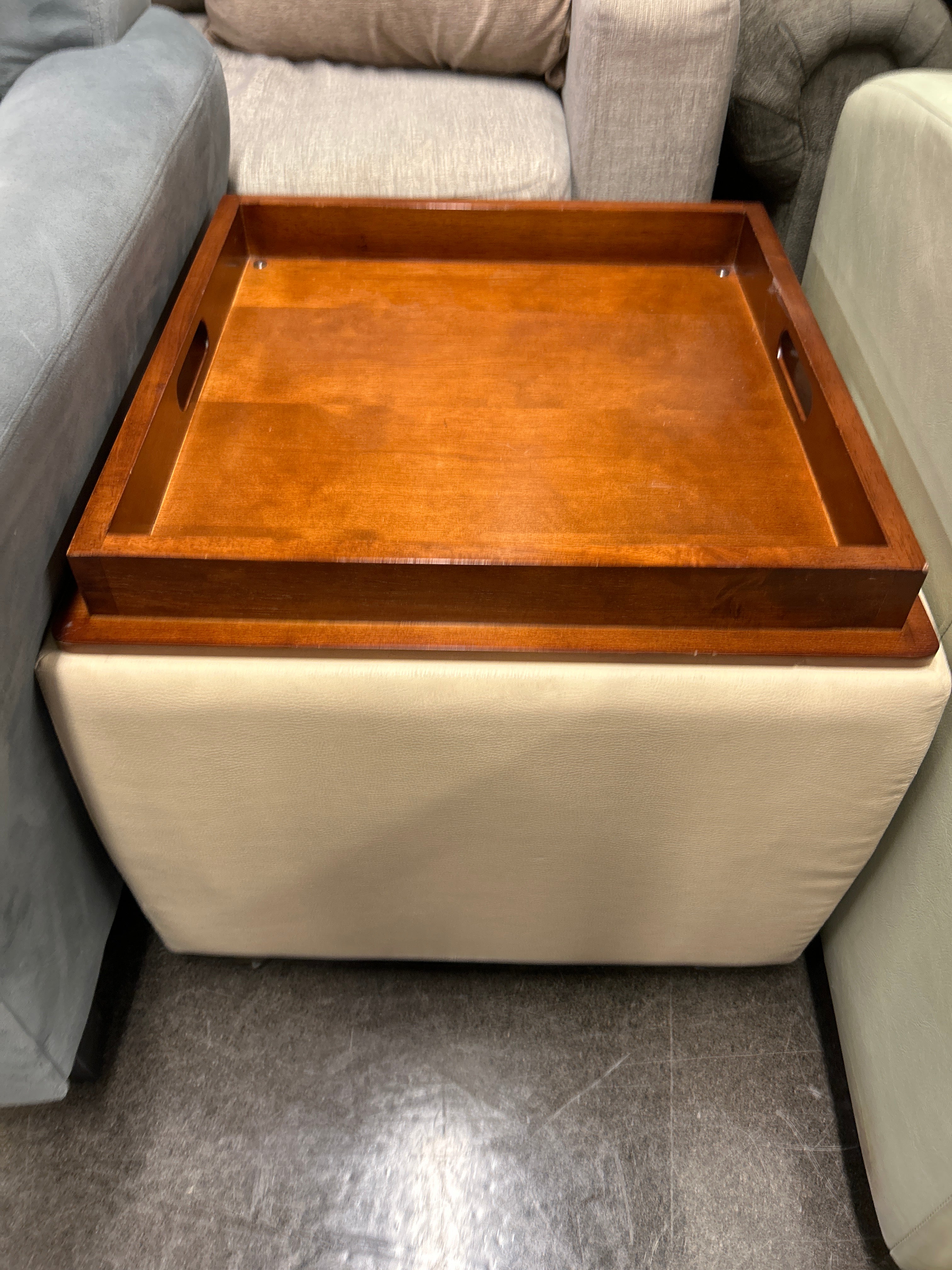 Lazy-e-Boy Leather tuffed ottoman, small rip