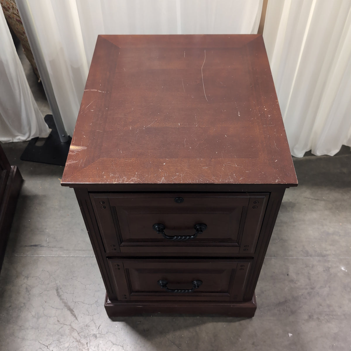 Dark Wood Two-Drawer Filing Cabinet with Ornate Pulls