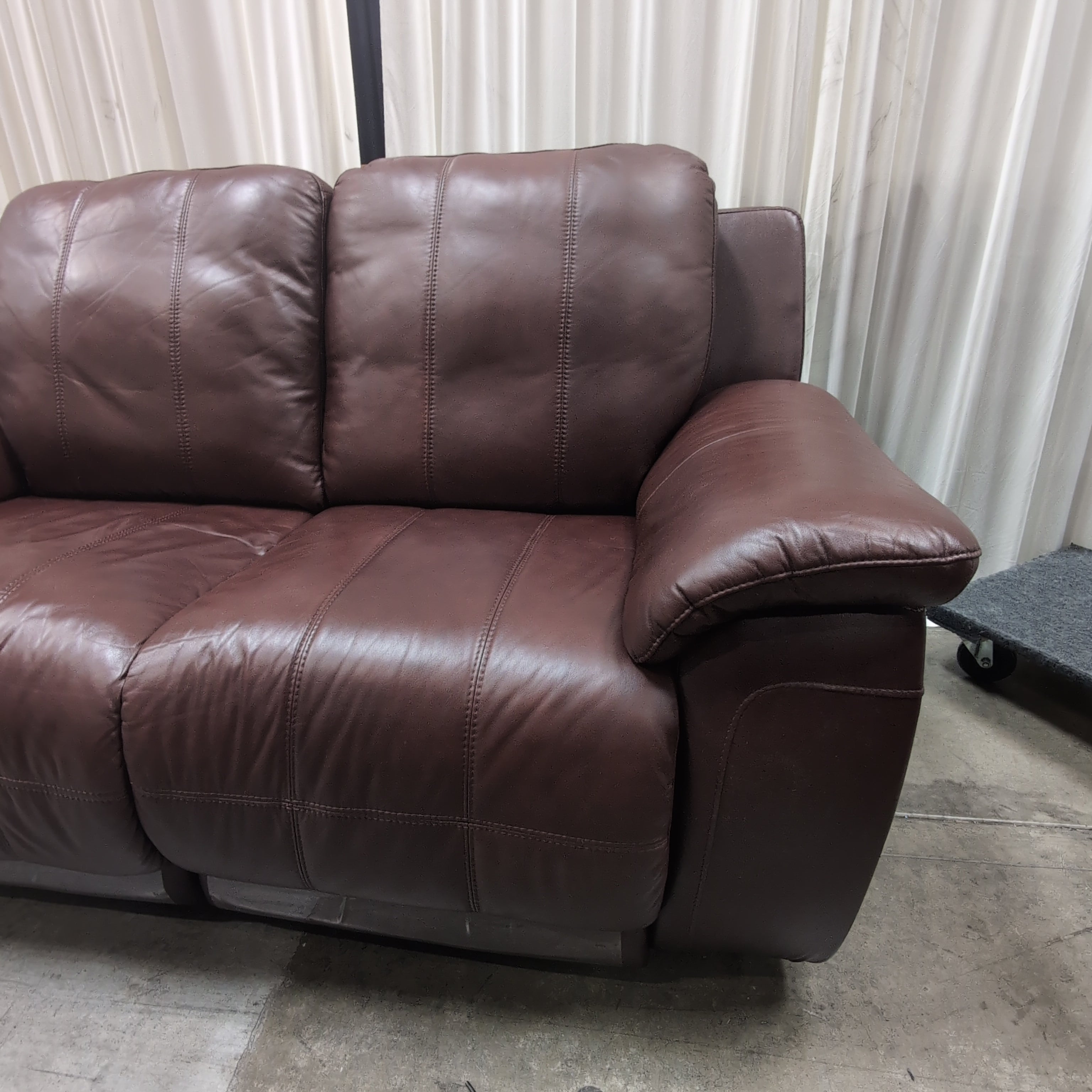 Deep Brown Leather Reclining Loveseat with Padded Arms