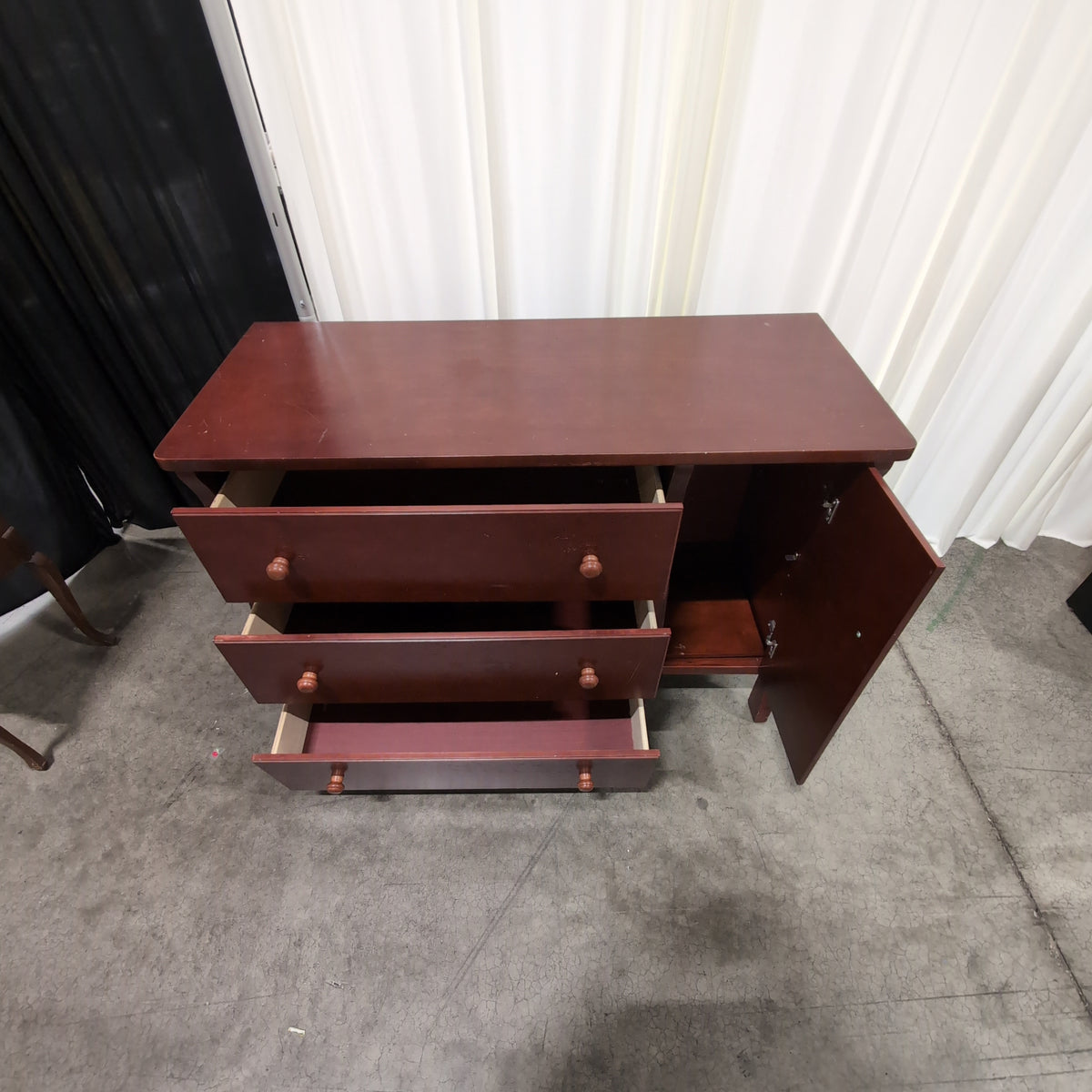 Reddish Brown Wood Dresser with Cabinet Door