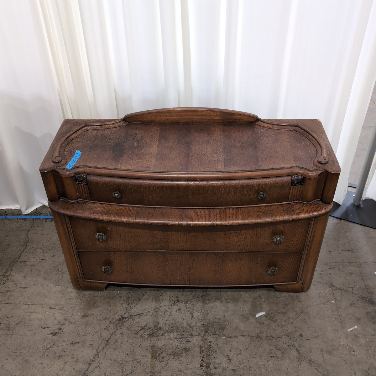 Traditional Brown Wood Three Drawer Dresser with Ornate Pulls