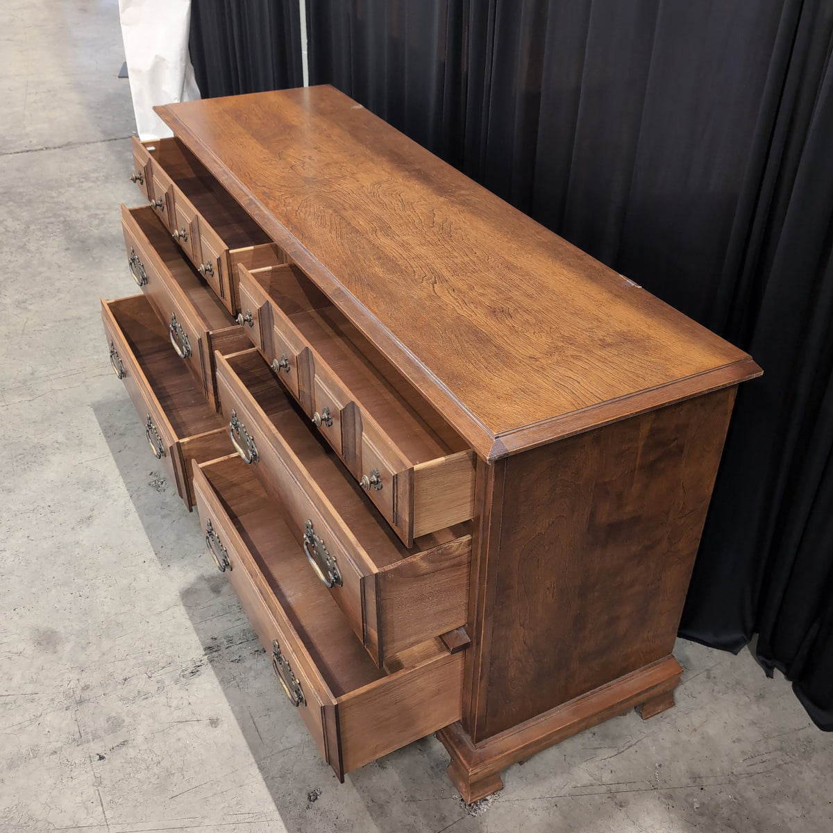 Traditional Brown Wood Dresser with Ornate Hardware