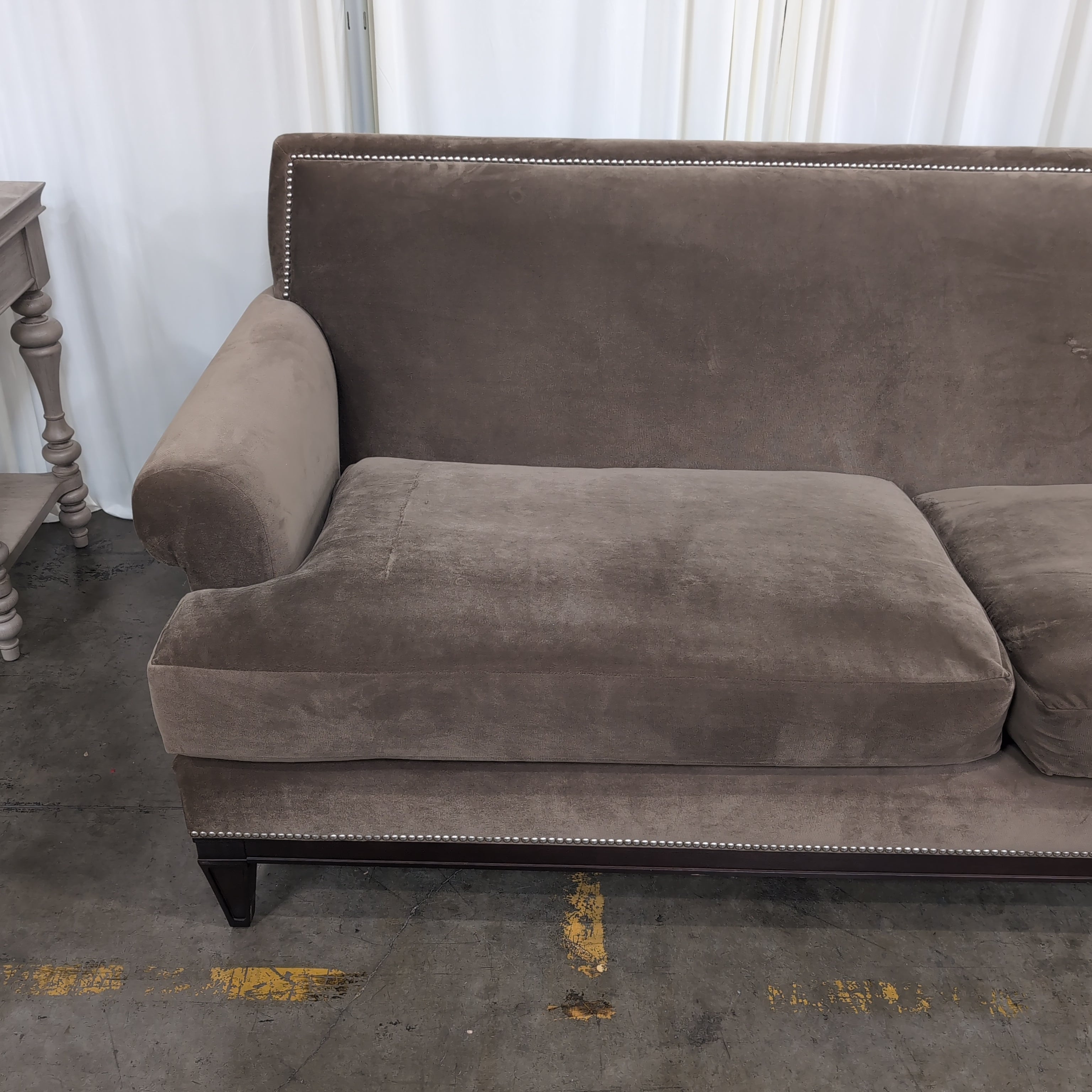 Taupe Fabric Two-Seat Couch with Nailhead Trim