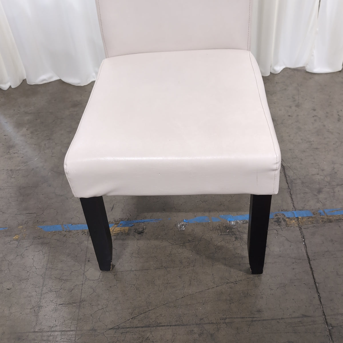 Cream Upholstered High-Back Dining Chair with Dark Legs