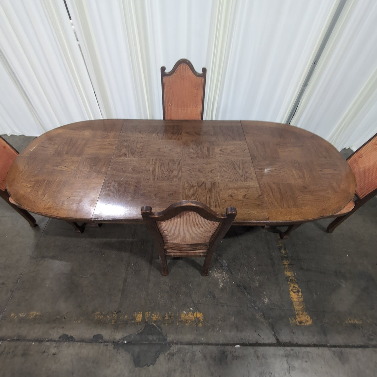 Traditional Dark Wood Oval Dining Table with Four Chairs