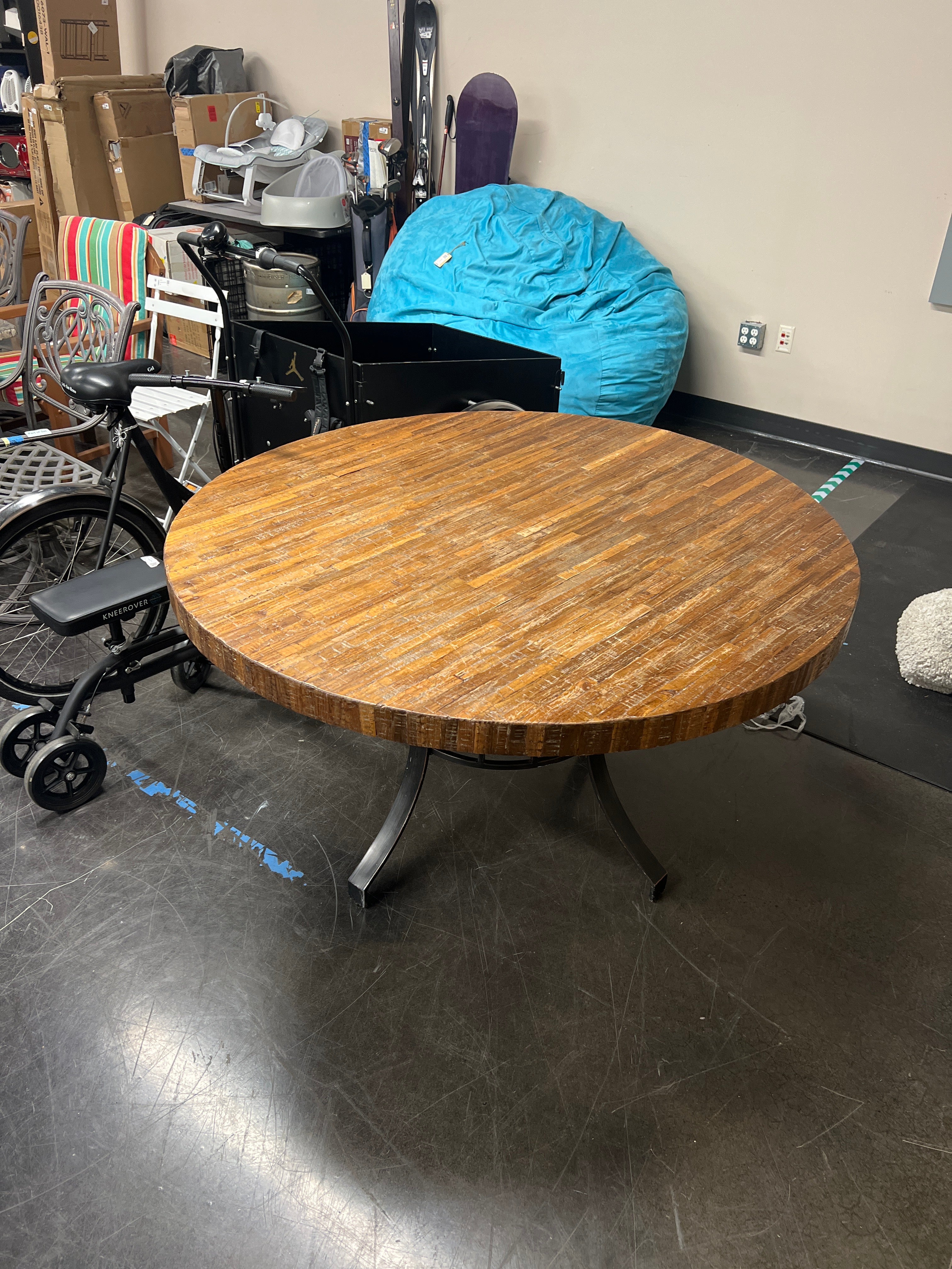 Rustic Round Wood Plank Dining Table with Industrial Metal Base